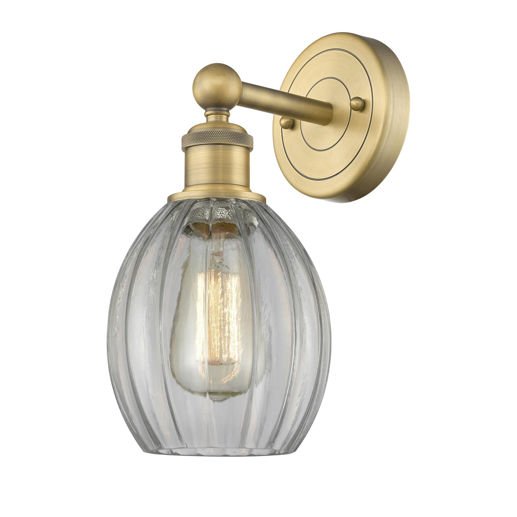 Shown in Brushed Brass finish and Clear glass