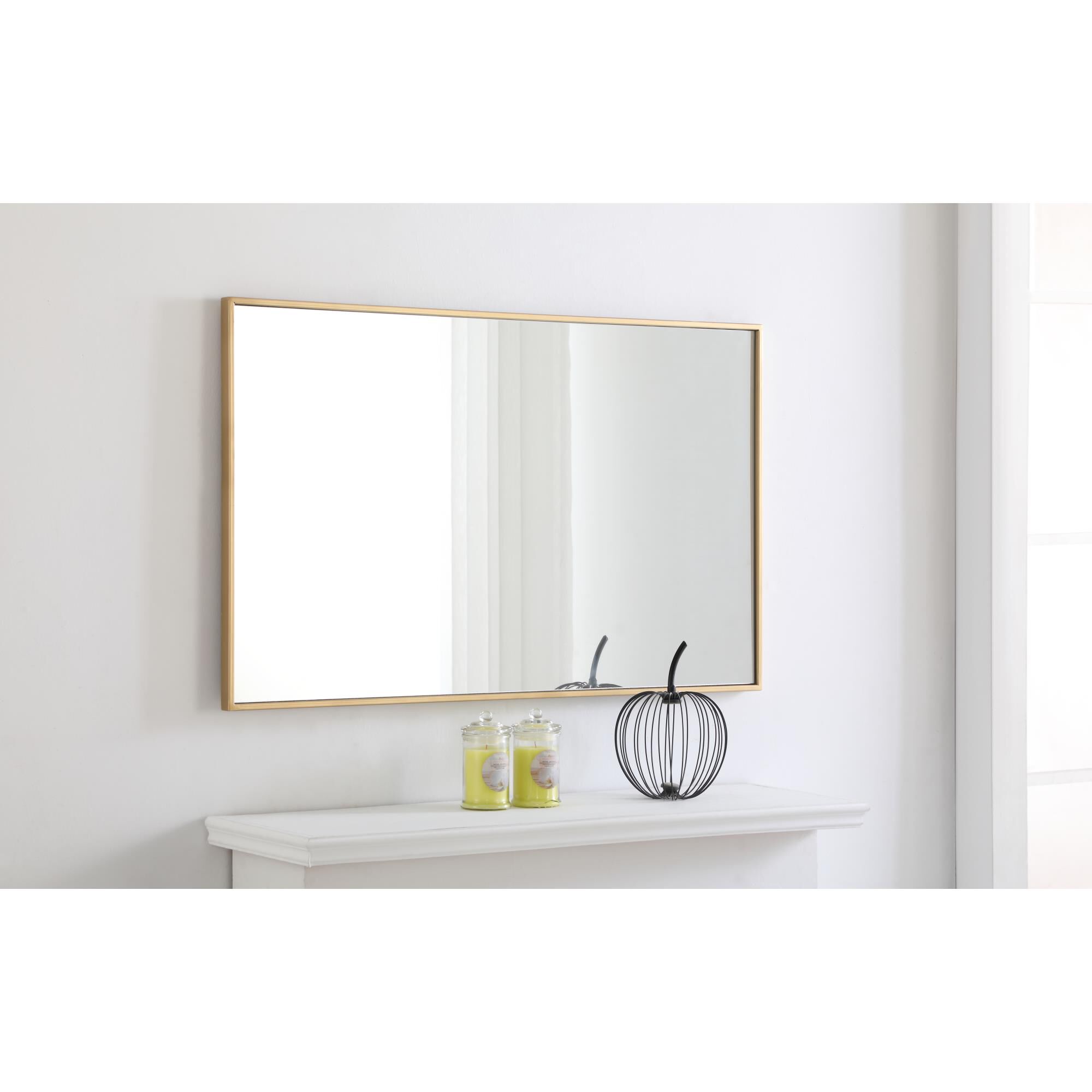 Shown in Brass finish and Clear Mirror Beveled glass