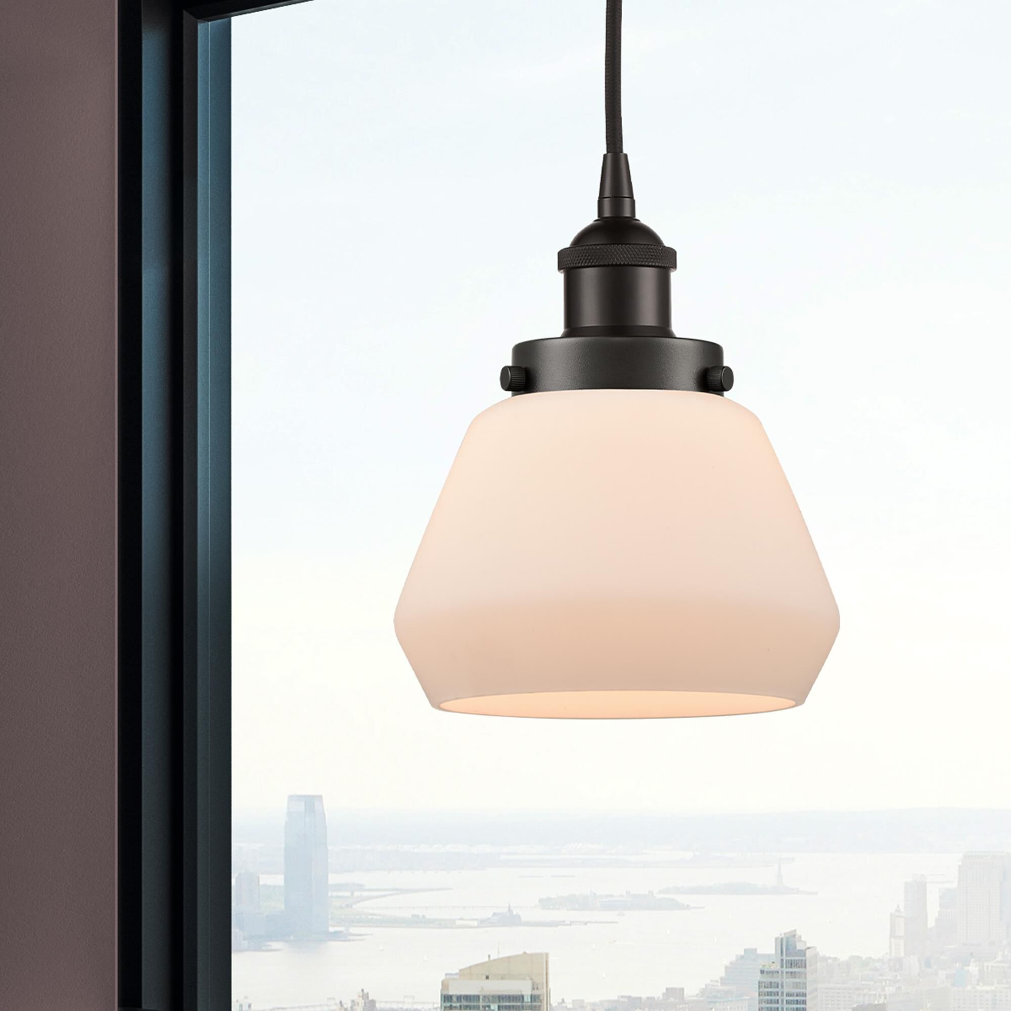 Shown in Oil Rubbed Bronze finish and Matte White glass