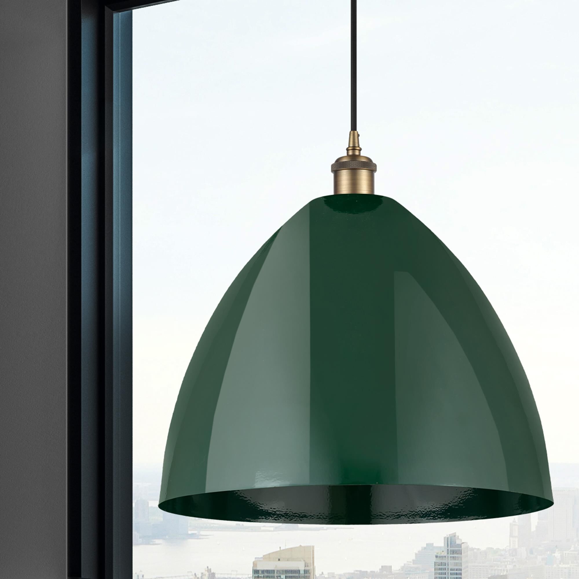 Shown in Brushed Brass finish and Green Plymouth Dome shade
