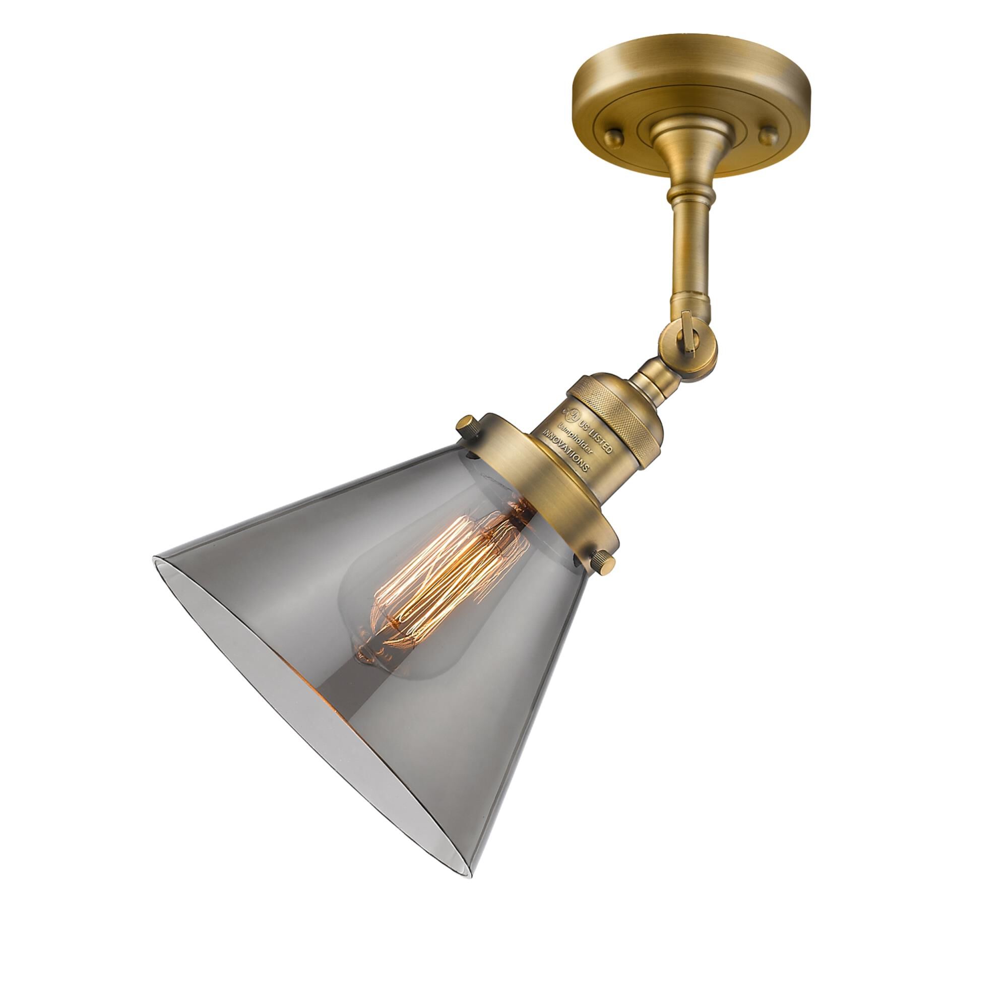 Shown in Brushed Brass finish and Smoked glass and None accent