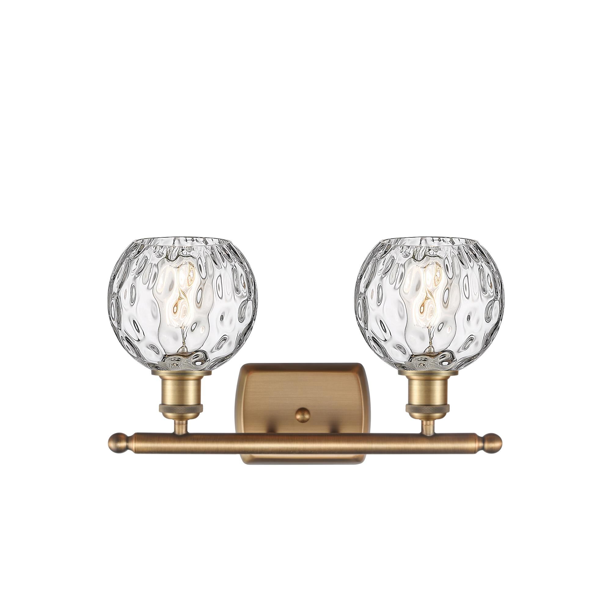 Shown in Brushed Brass finish and Clear glass