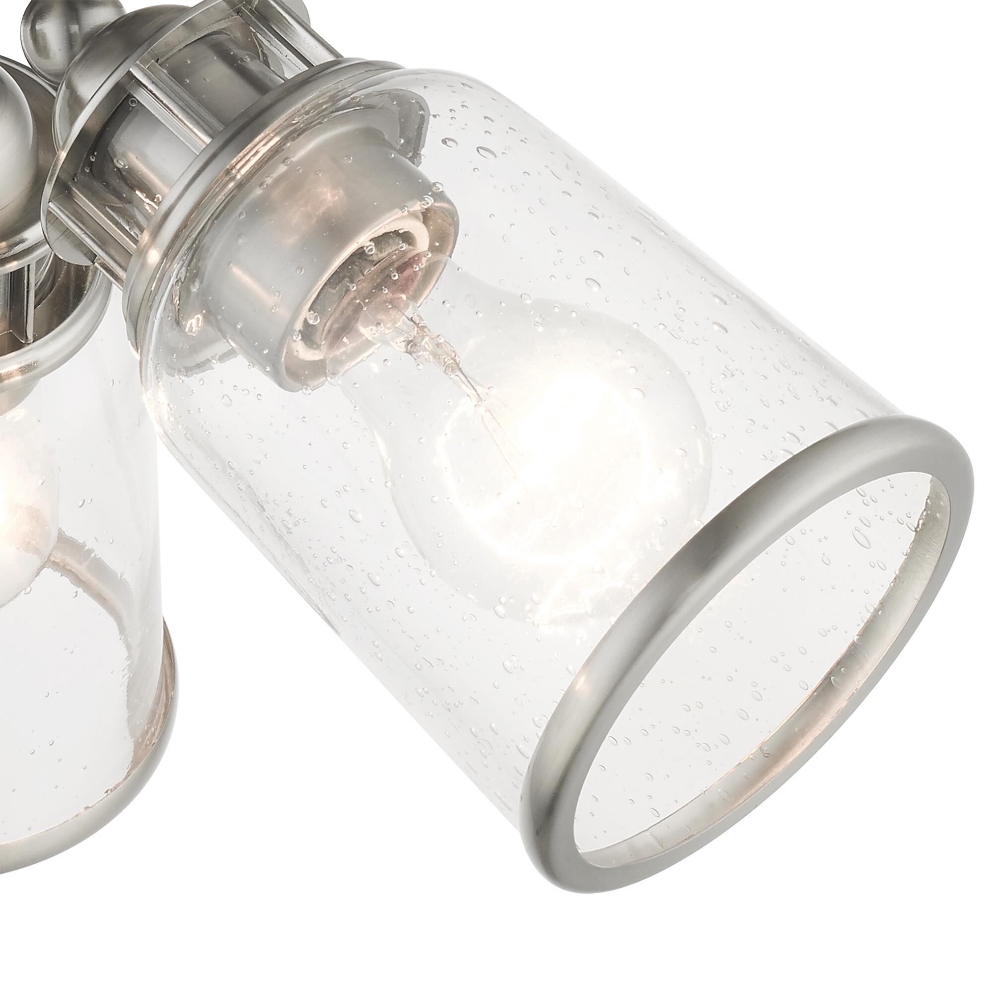 Shown in Brushed Nickel finish and Hand Blown Clear Seeded glass