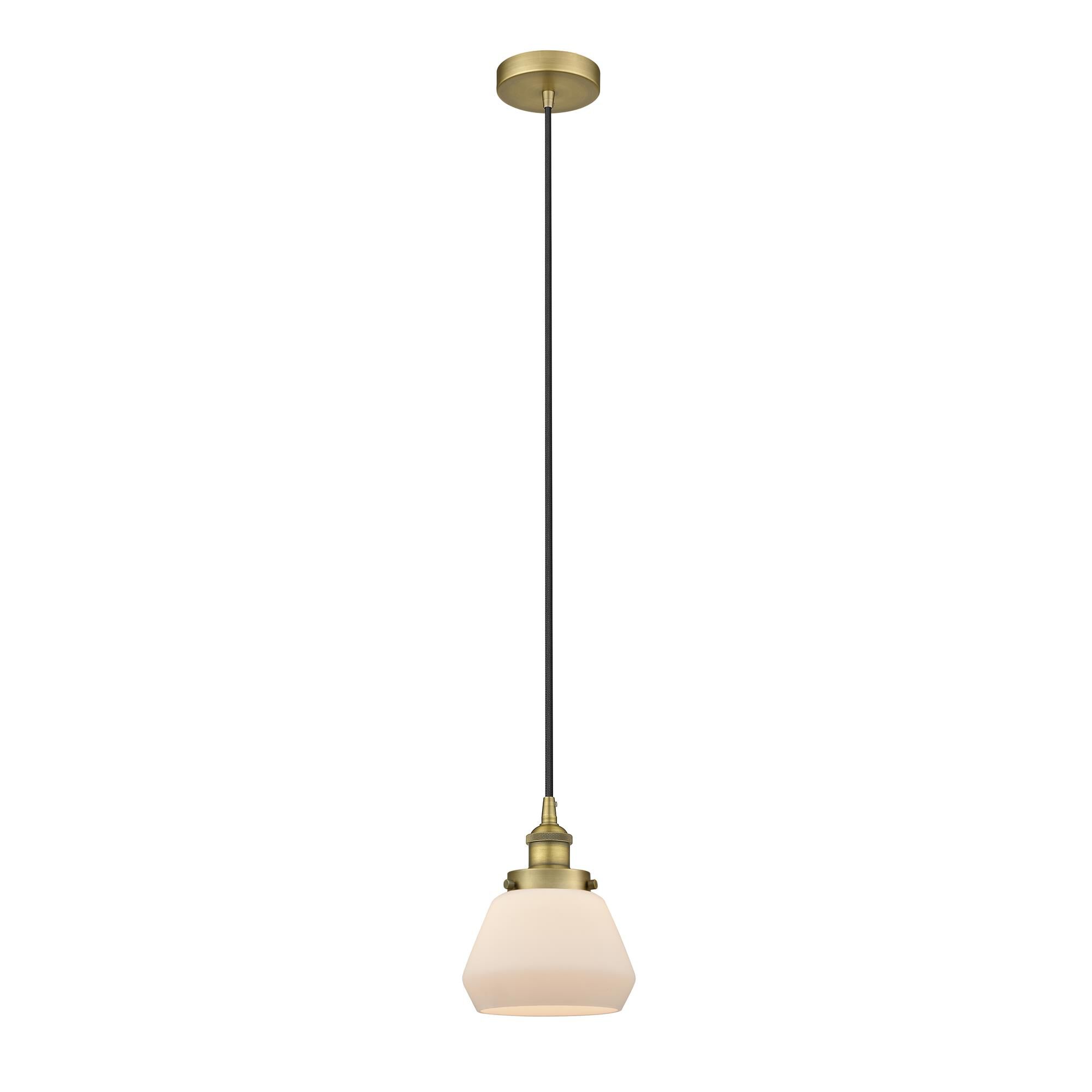 Shown in Brushed Brass finish and Matte White glass