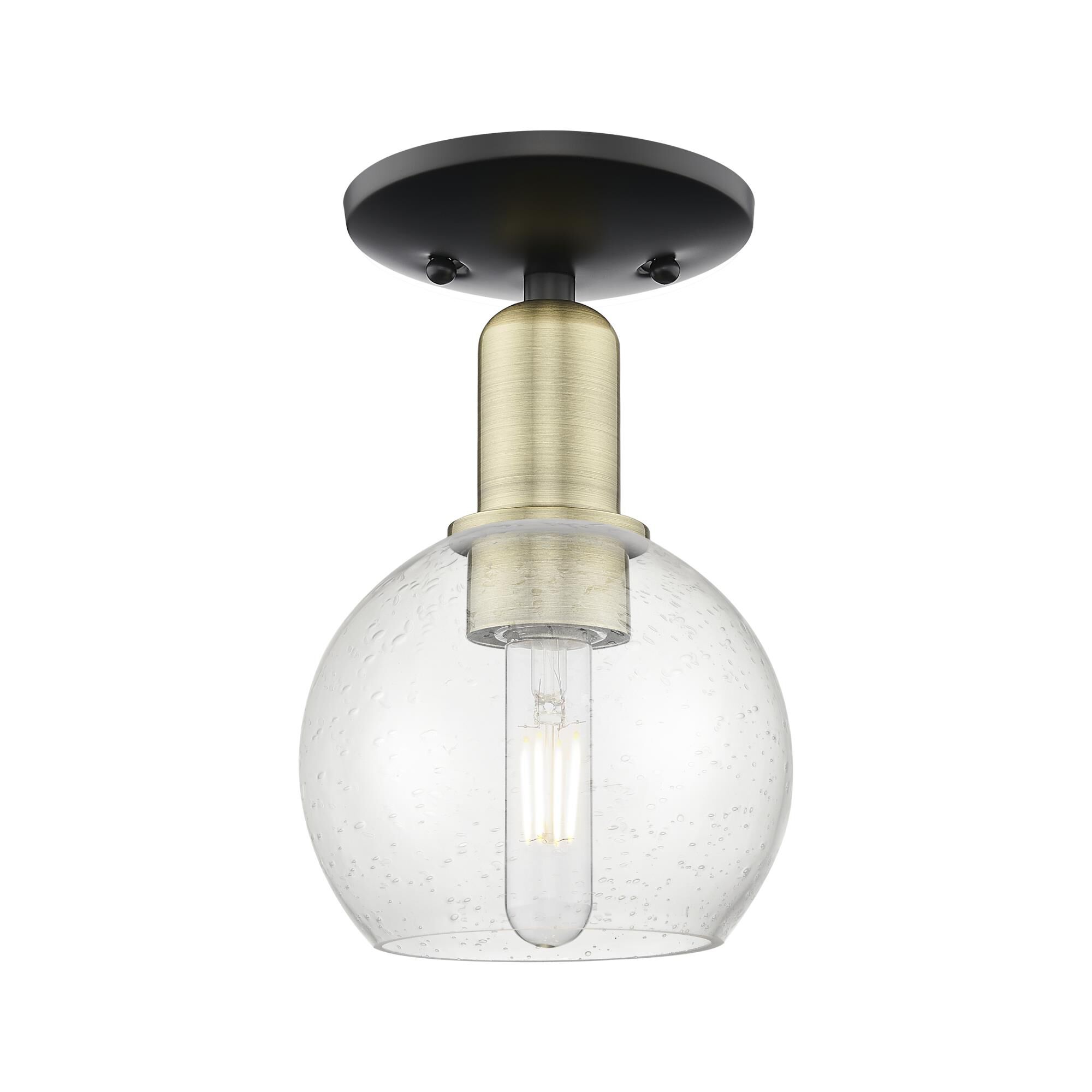 Shown in Black Antique Brass finish and Seedy glass