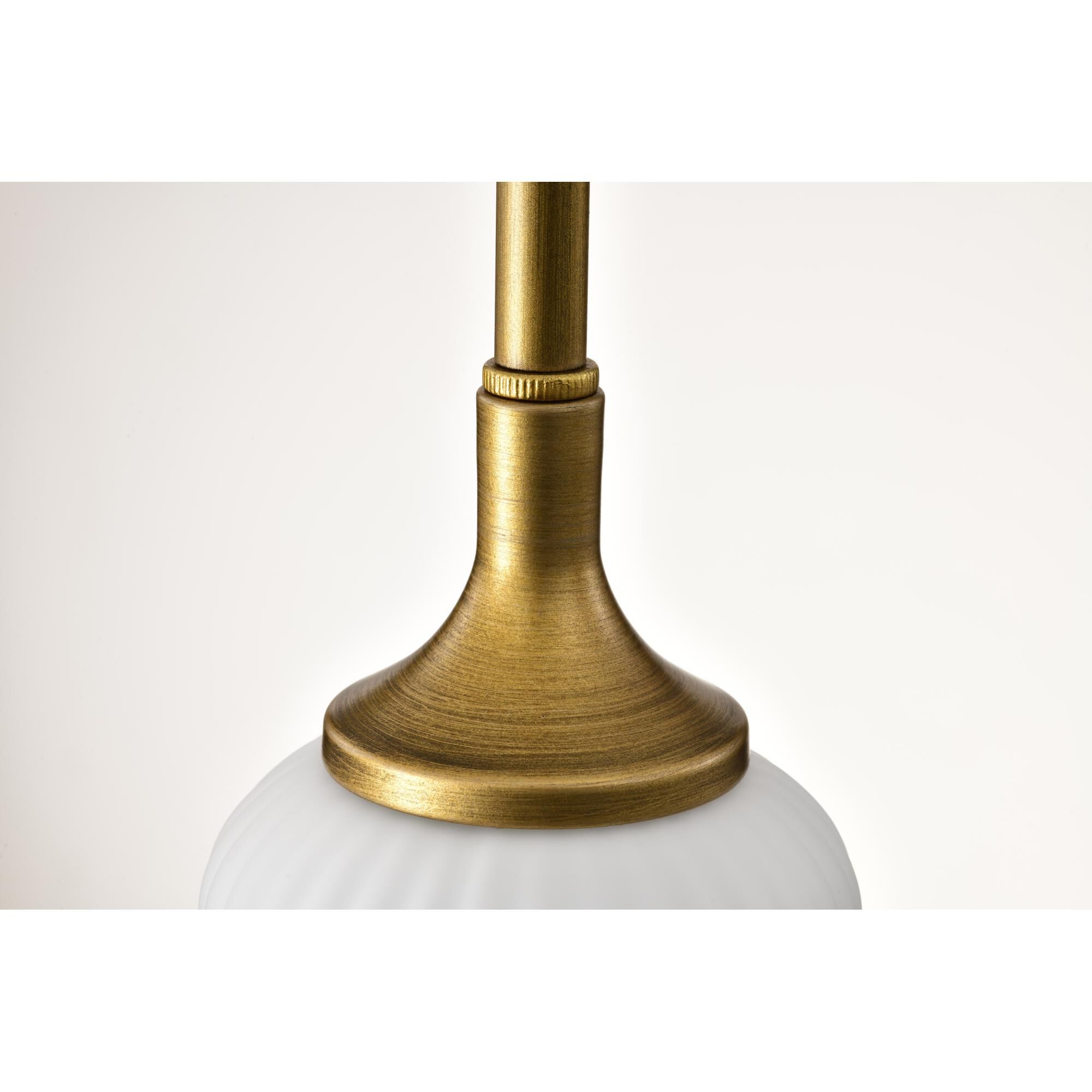 Shown in Natural Brass finish and Frosted Ribbed glass