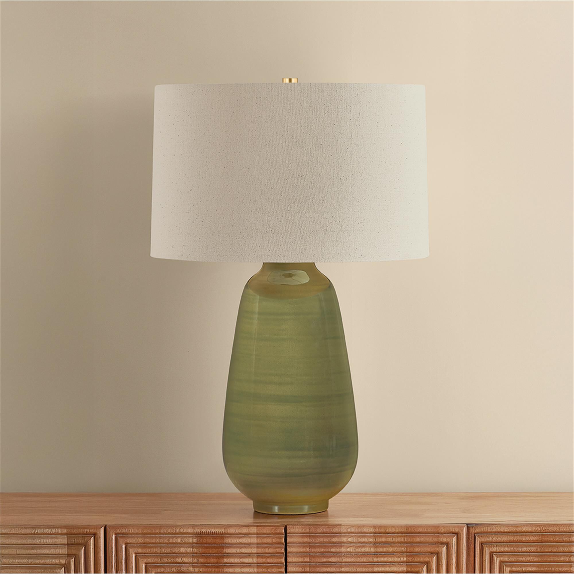 Shown in Aged Brass and Ceramic Dark Forrest finish and Wheat Linen shade