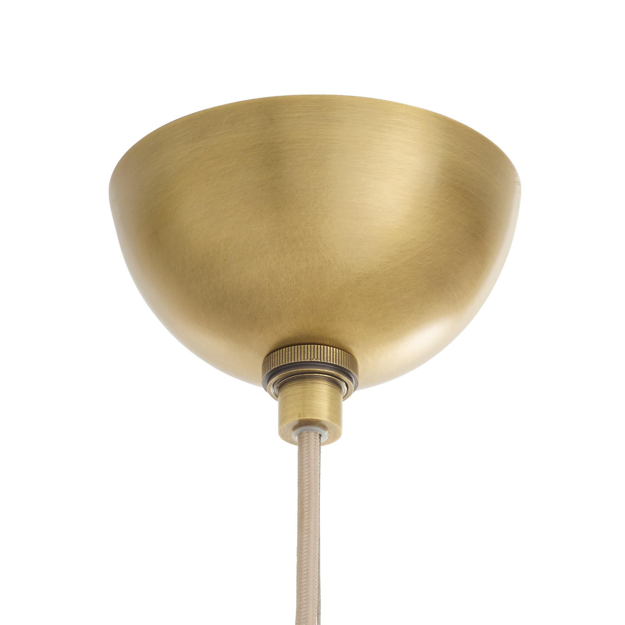 Shown in Antique Brass finish and Matte Swirl glass