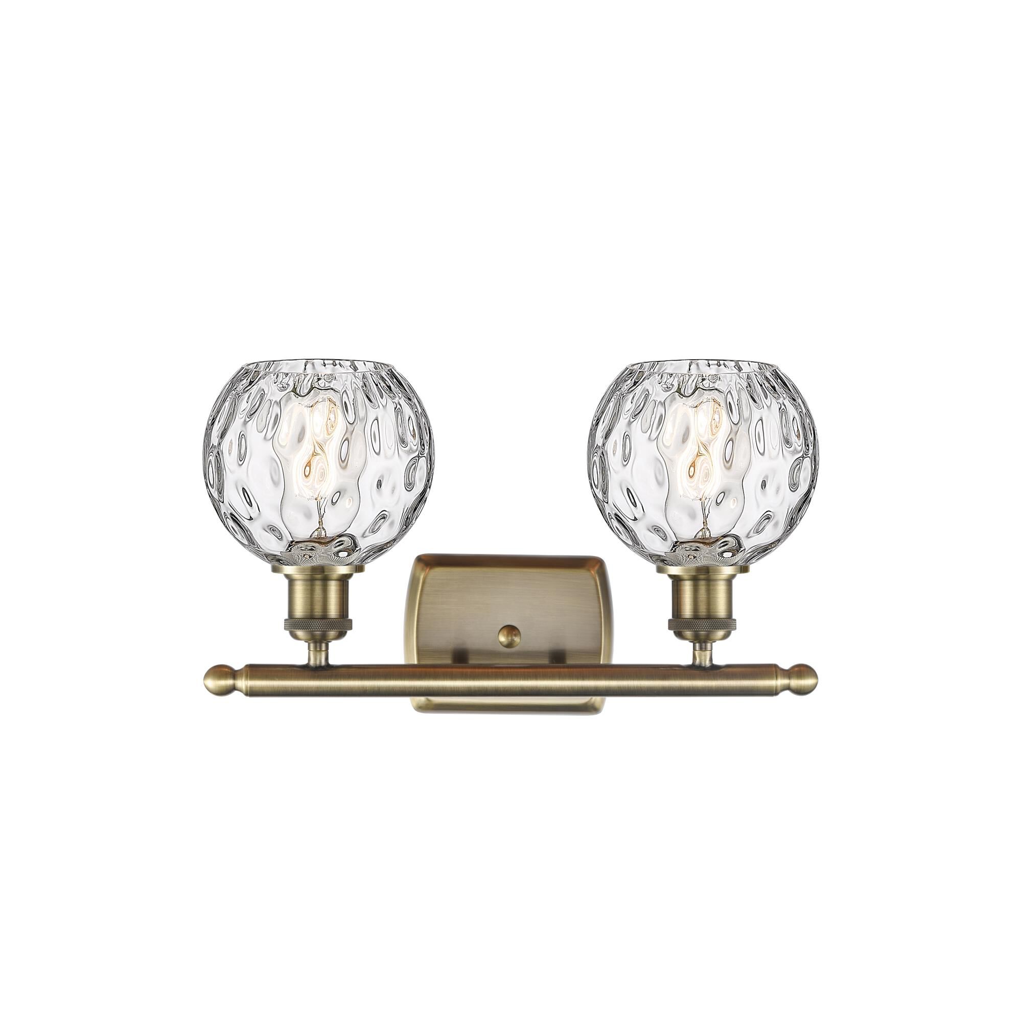 Shown in Antique Brass finish and Clear glass