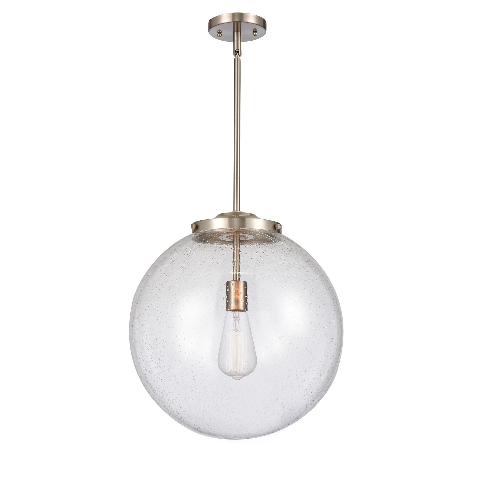 Shown in Brushed Satin Nickel finish and Seedy Beacon glass