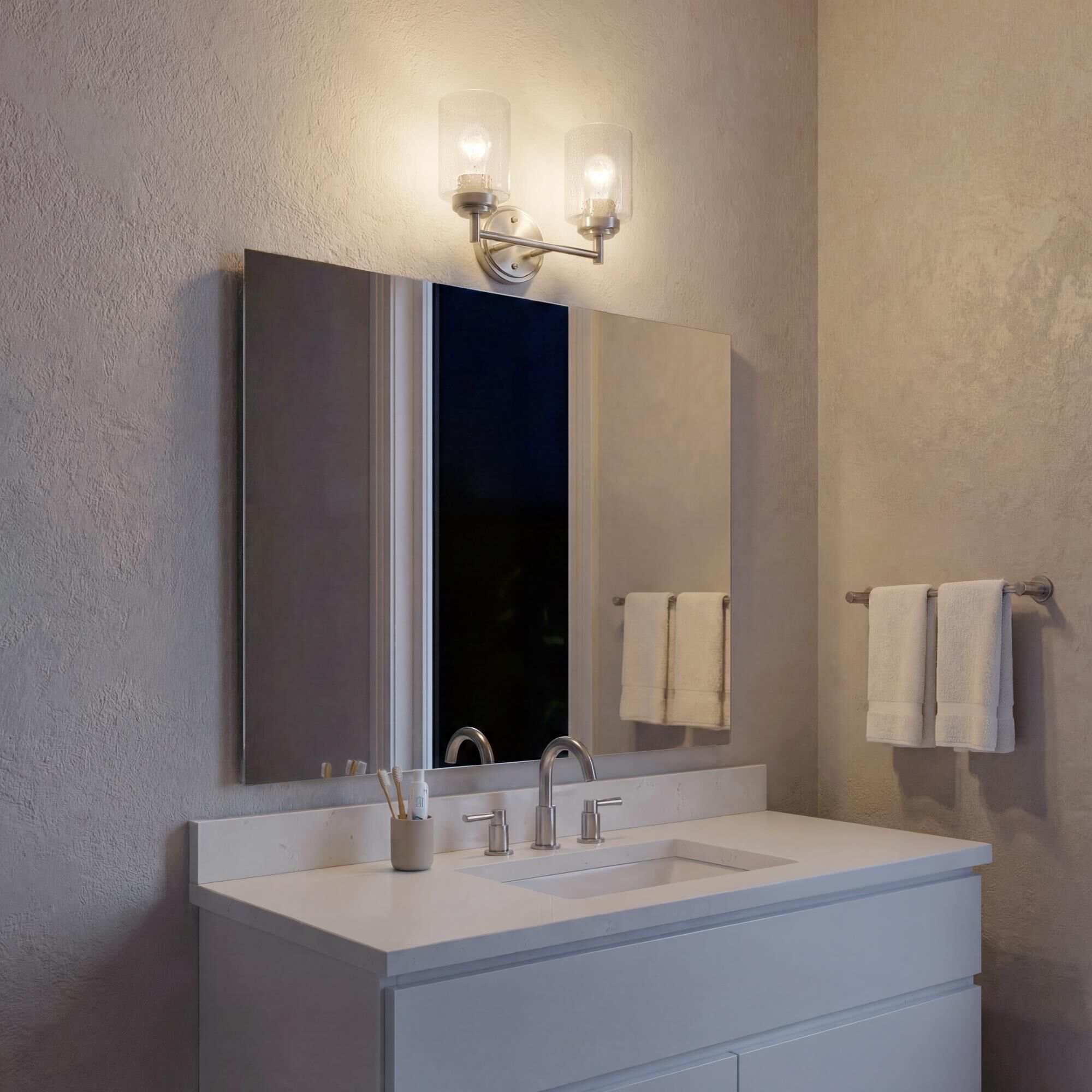 Shown in Brushed Nickel finish and Clear Seeded glass