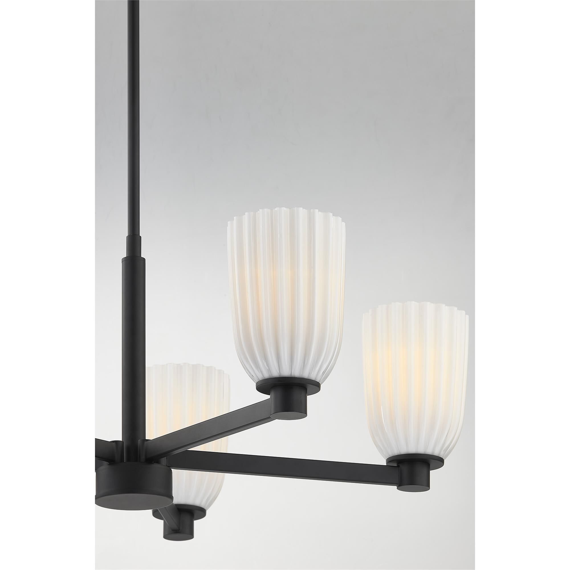 Shown in Matte Black finish and White Opal Ribbed glass