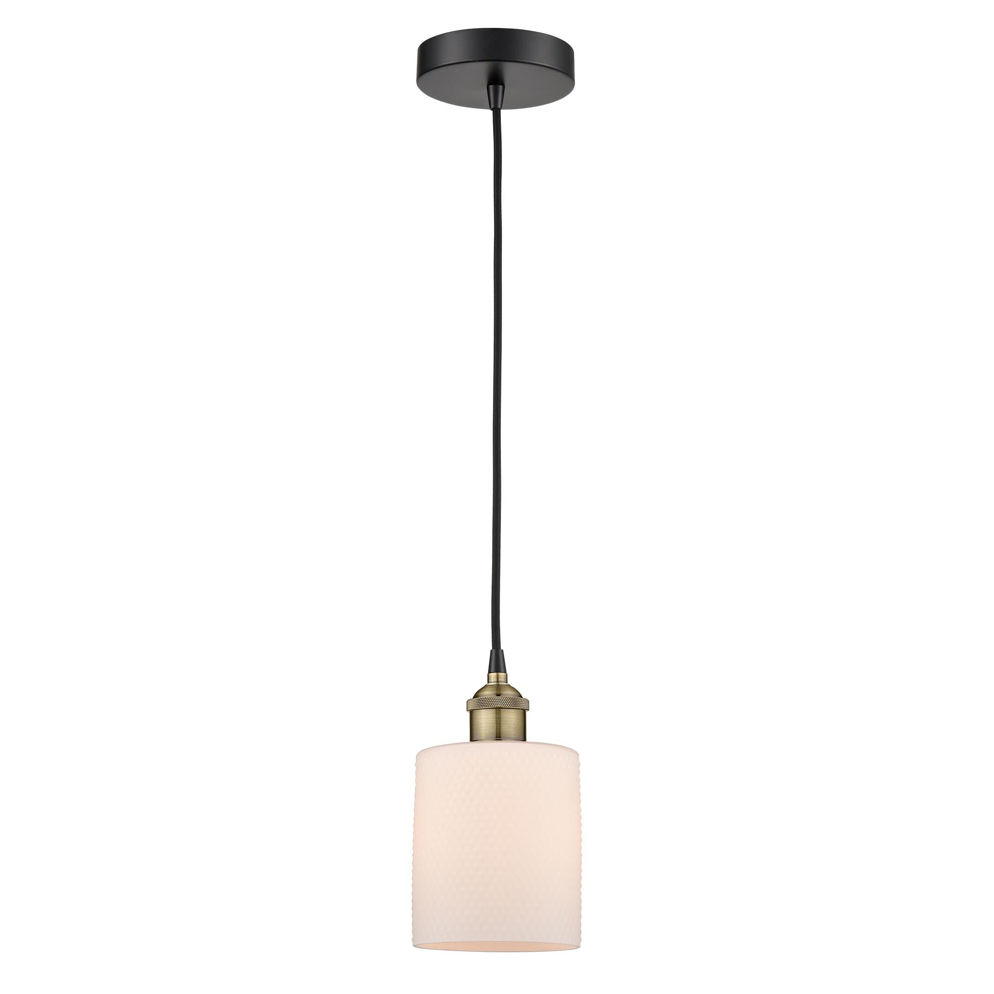 Shown in Black Antique Brass finish and Matte White glass