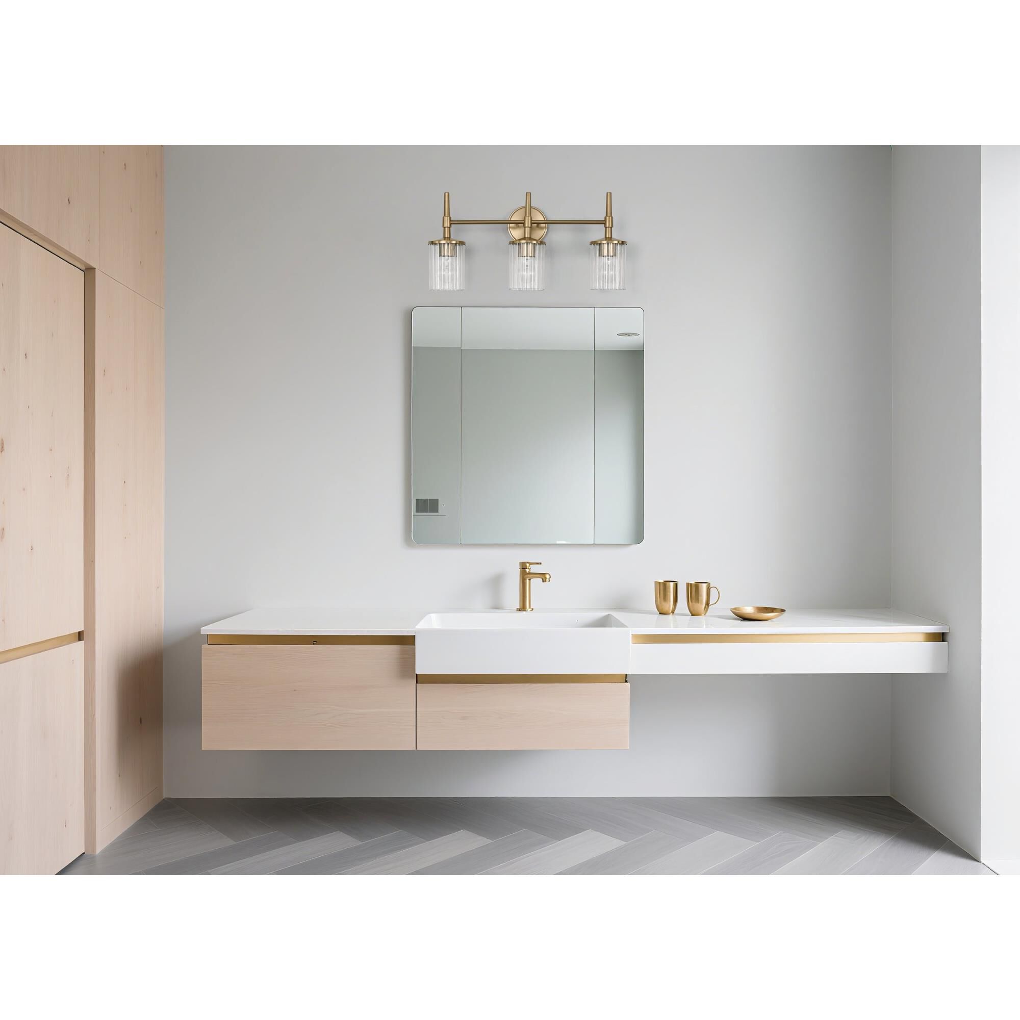 Shown in Champagne Gold finish and Clear Ribbed glass