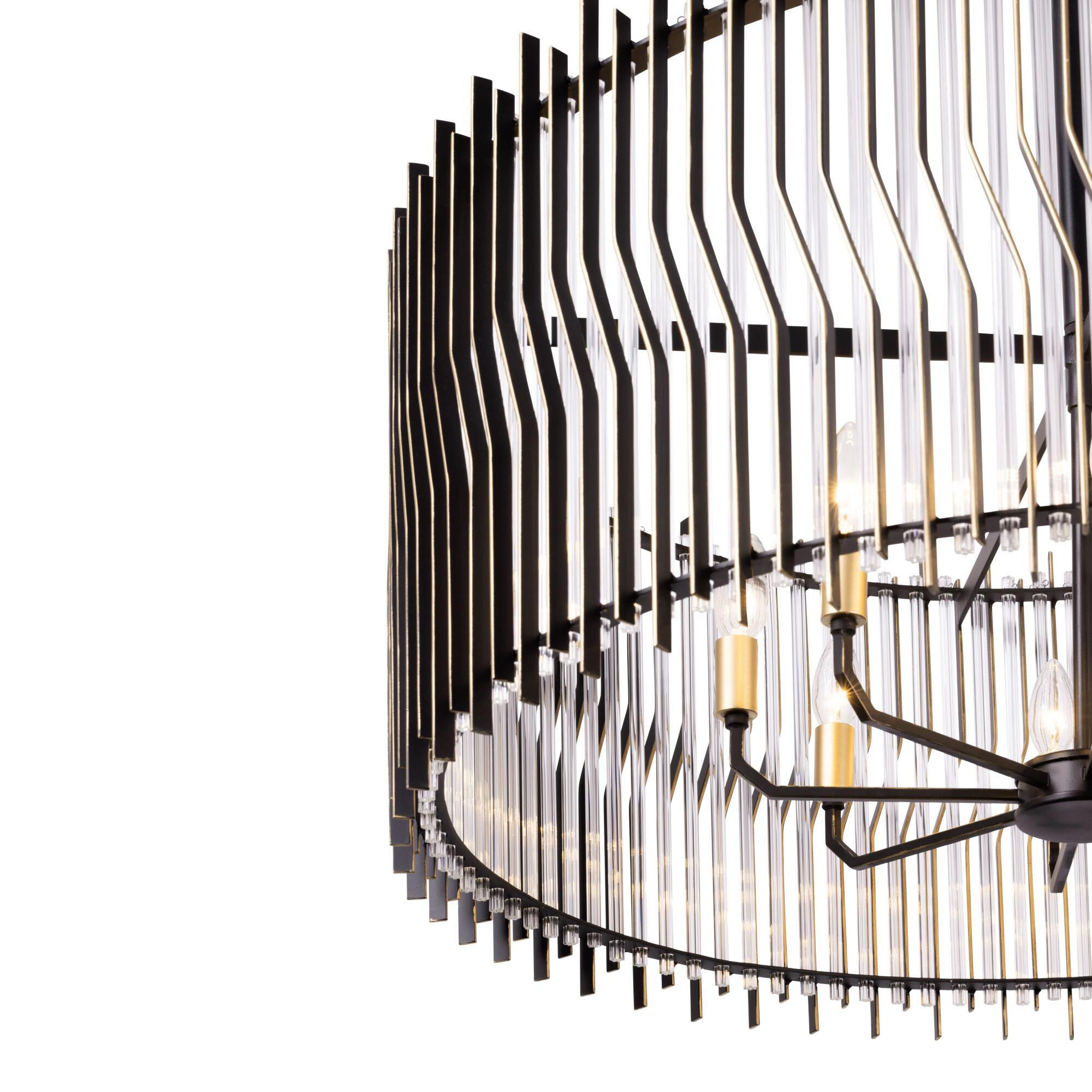 Shown in Matte Black/French Gold finish and Modern Clear Fluted shade