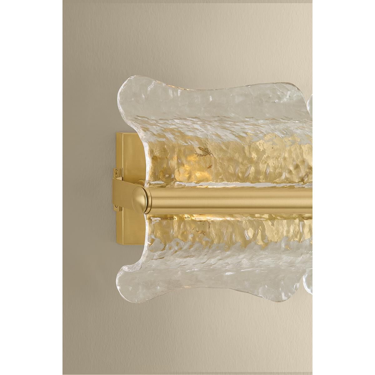 Shown in Aged Brass finish and Clear Optic glass
