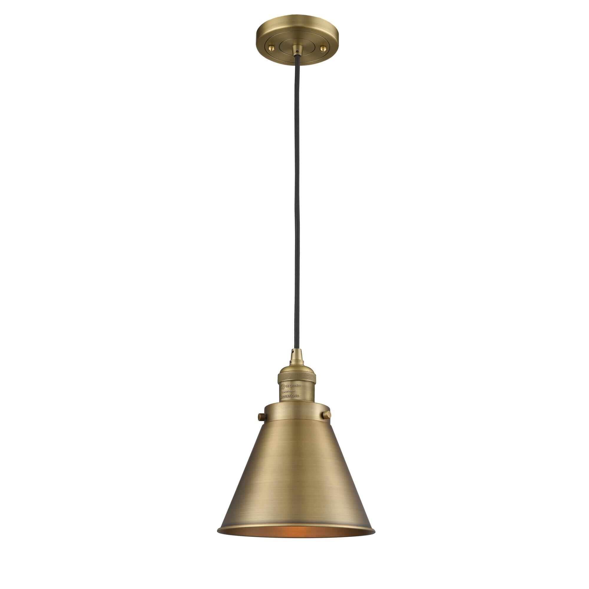Shown in Brushed Brass finish and Metal - Brushed Brass - Cone shade and Black Textured Cord accent