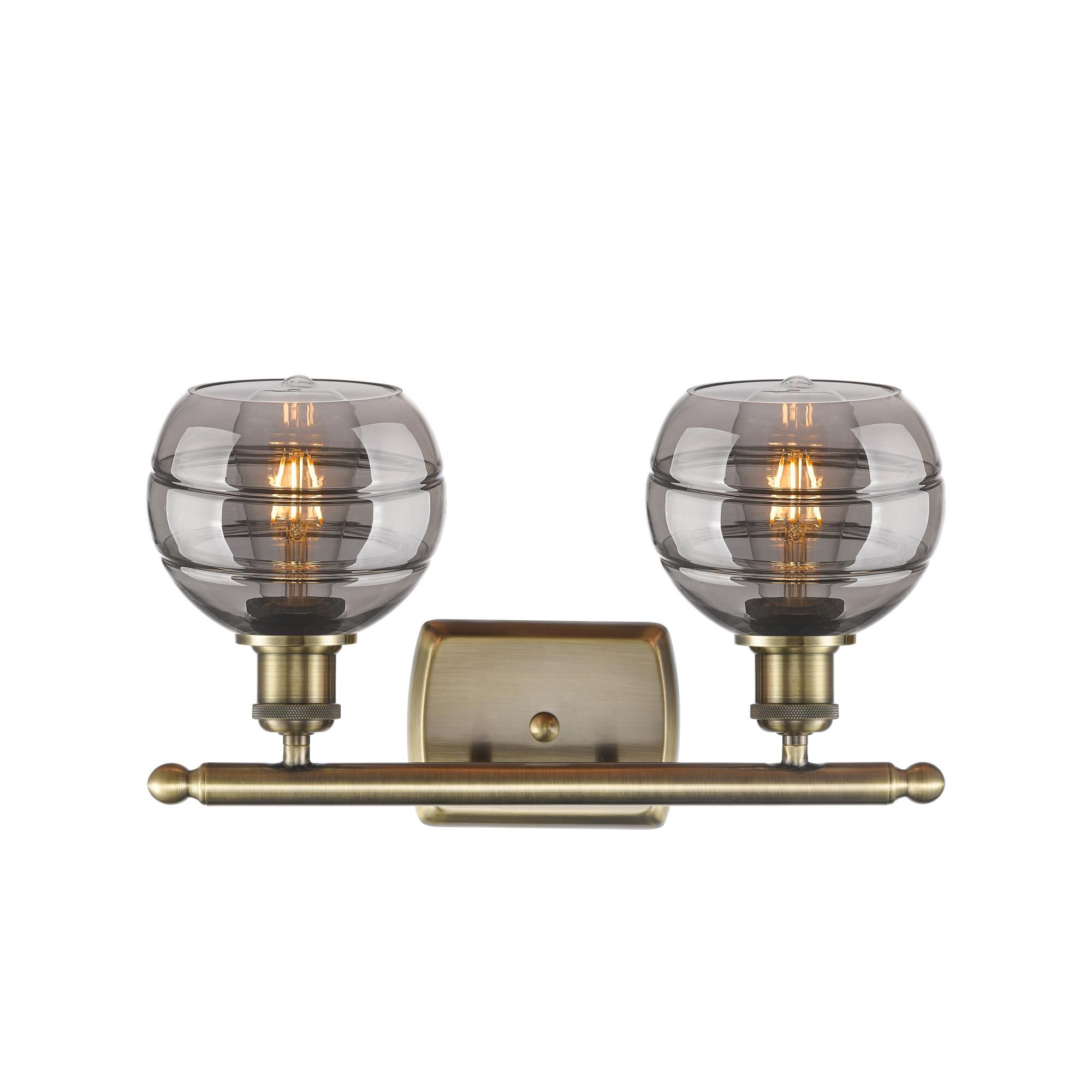 Shown in Antique Brass finish and Light Smoke glass