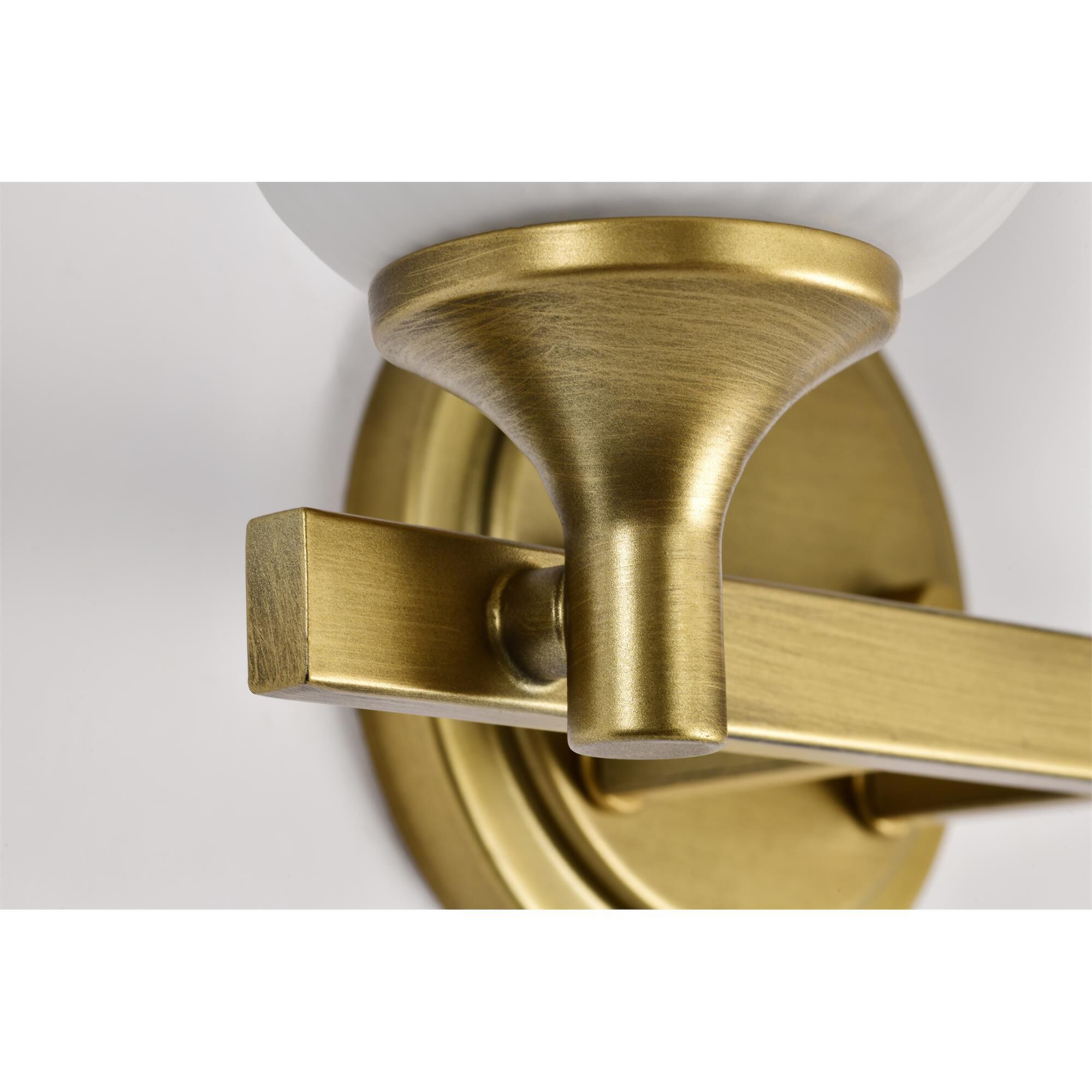 Shown in Natural Brass finish and Frosted Ribbed glass