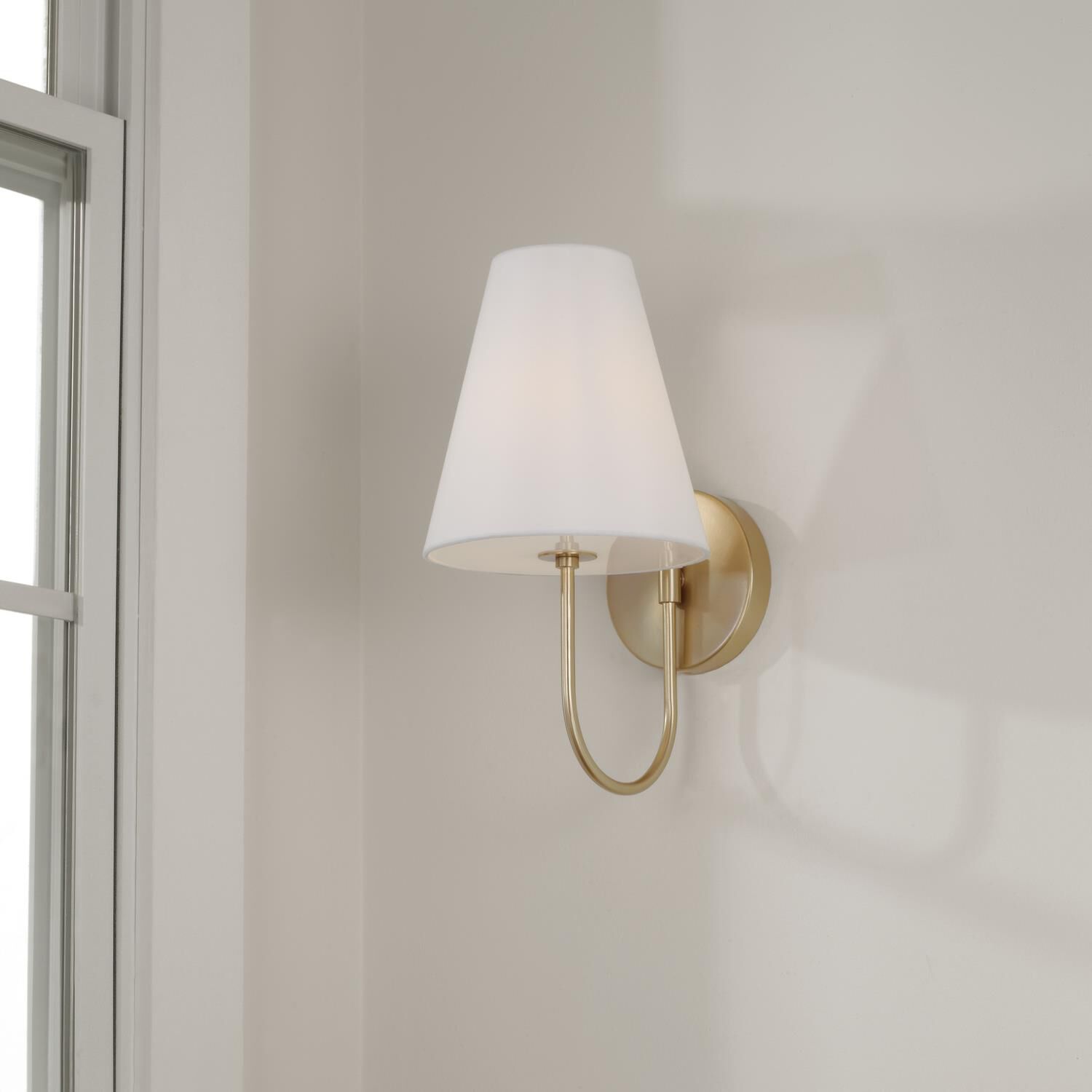 Shown in Matte Brass finish and Soft White Fabric Stay-Straight shade