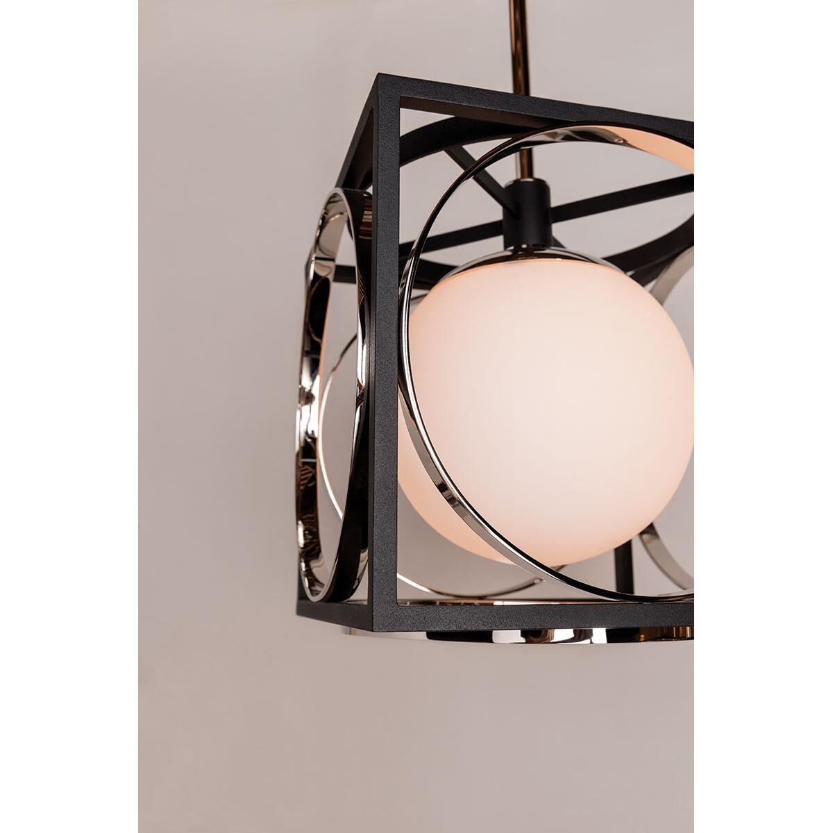 Shown in Polished Nickel-Black finish and Opal glass