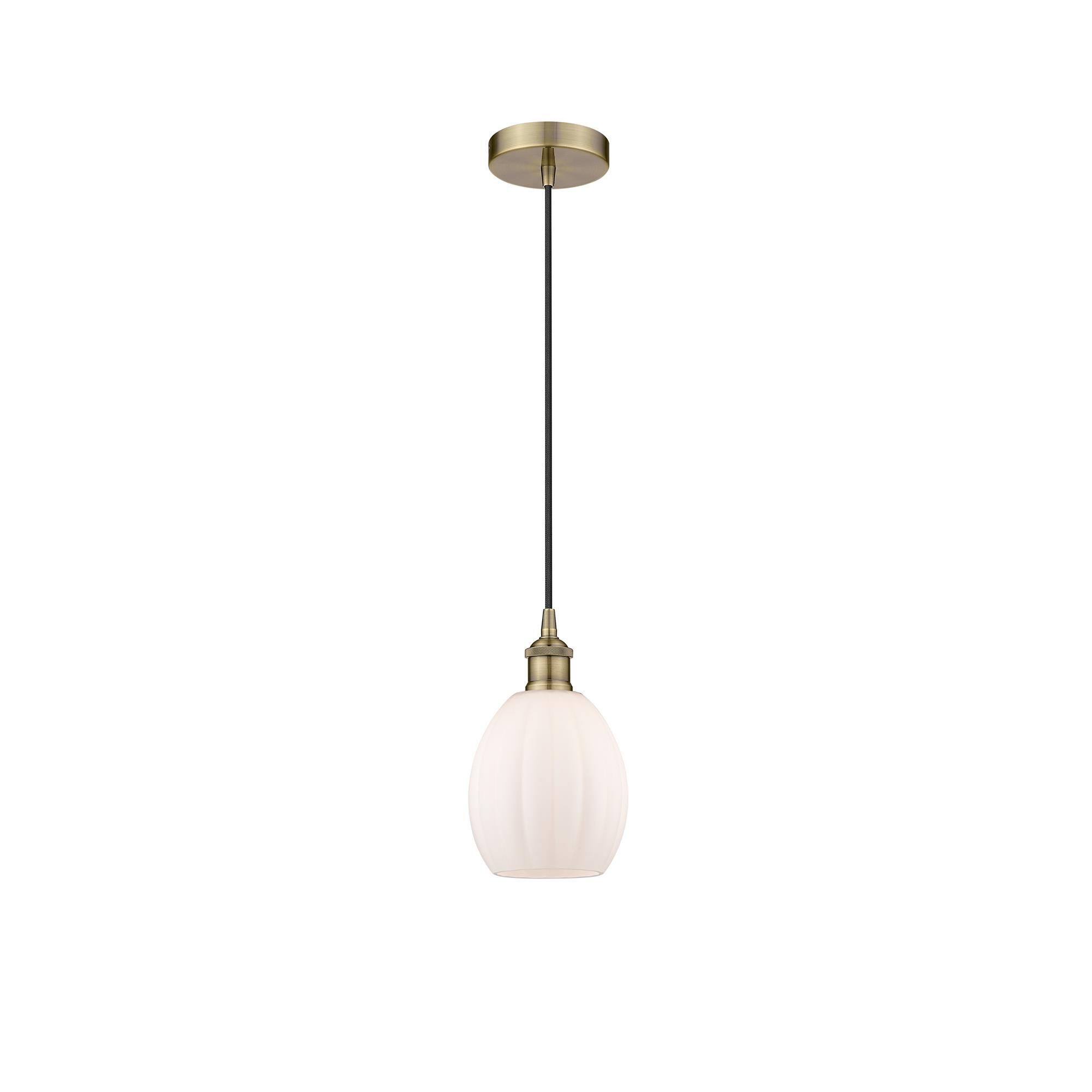 Shown in Antique Brass finish and Matte White Eaton glass