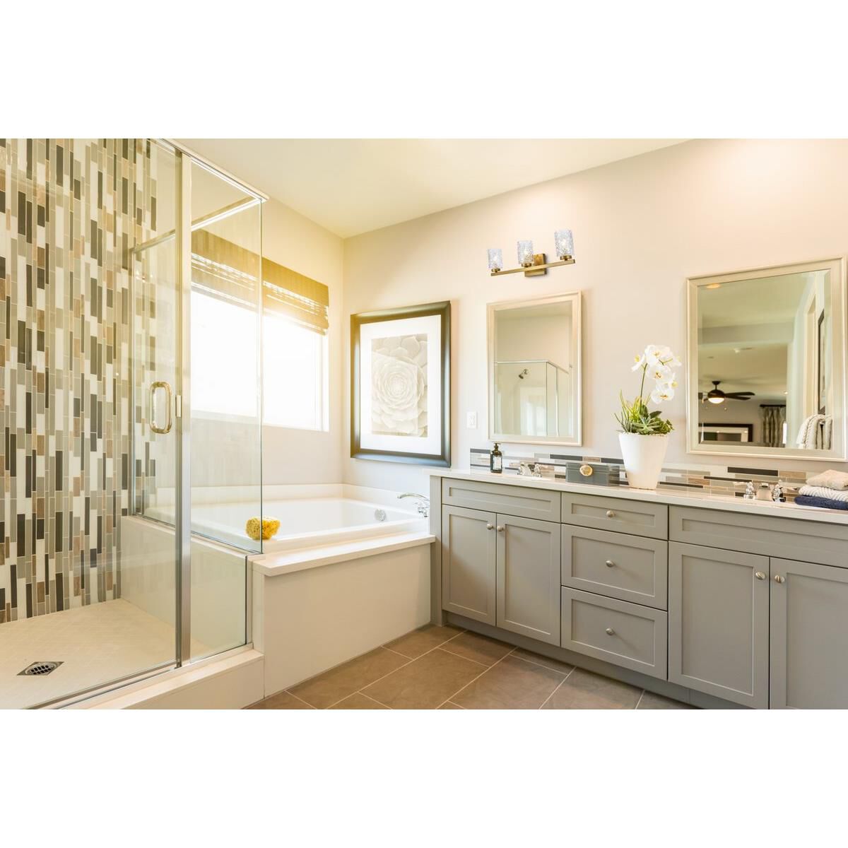 Shown in Brass finish and Clear glass