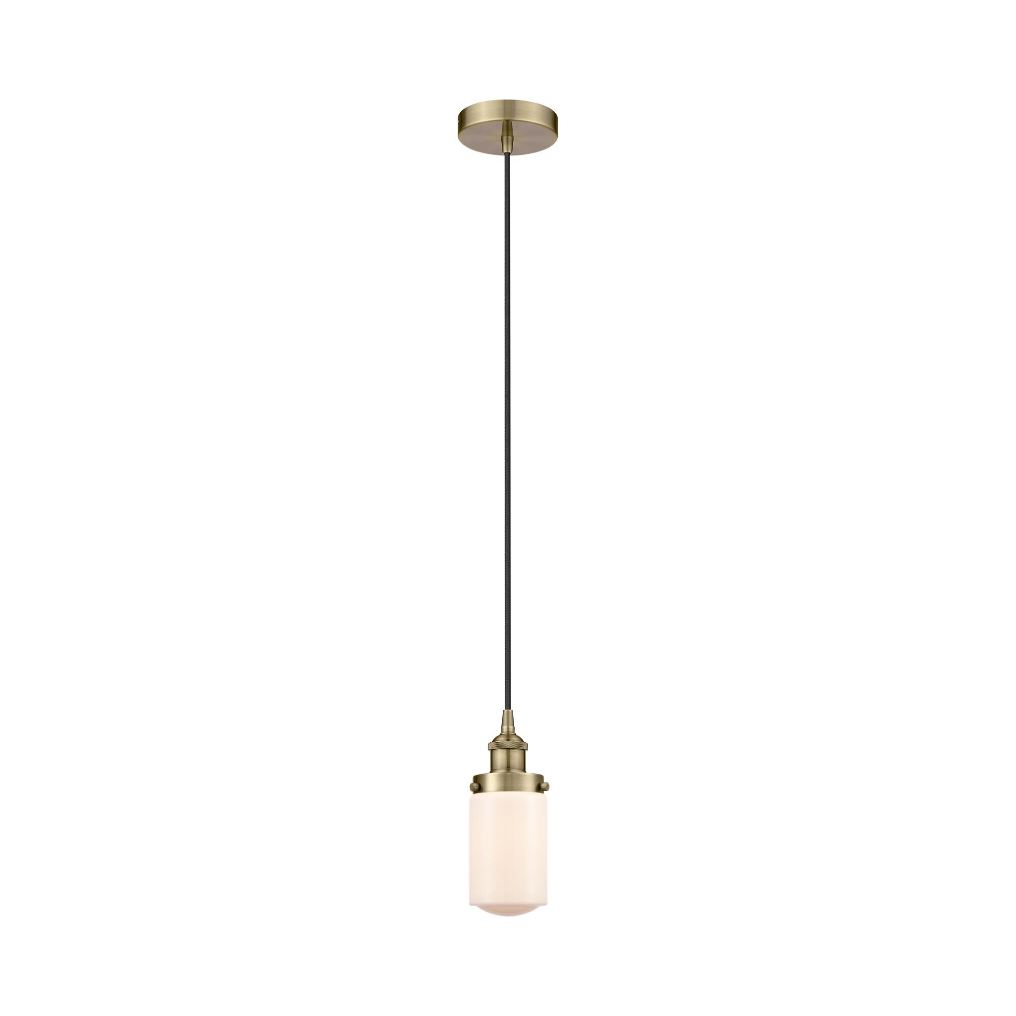 Shown in Antique Brass finish and Matte White glass