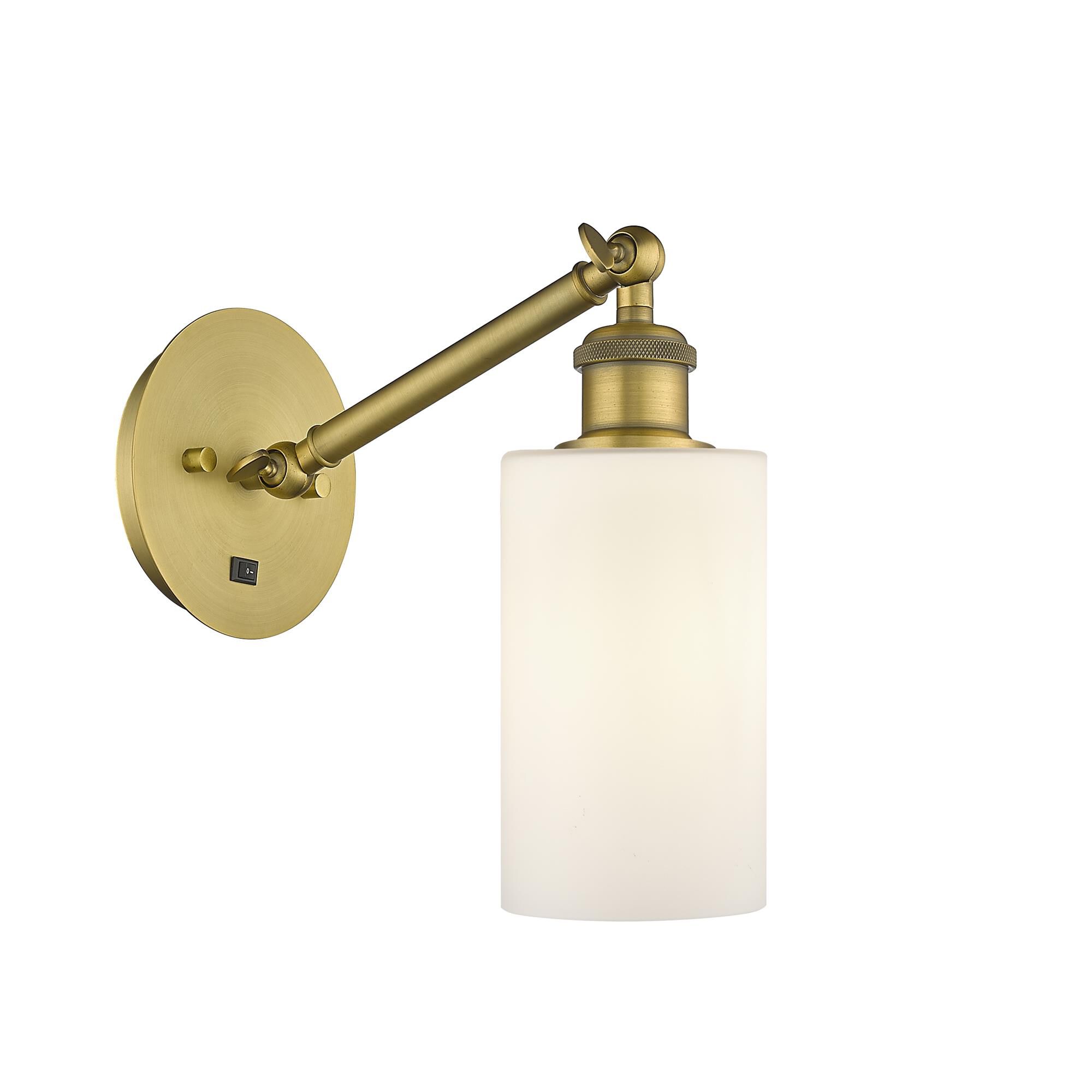 Shown in Brushed Brass finish and Matte White Clymer glass