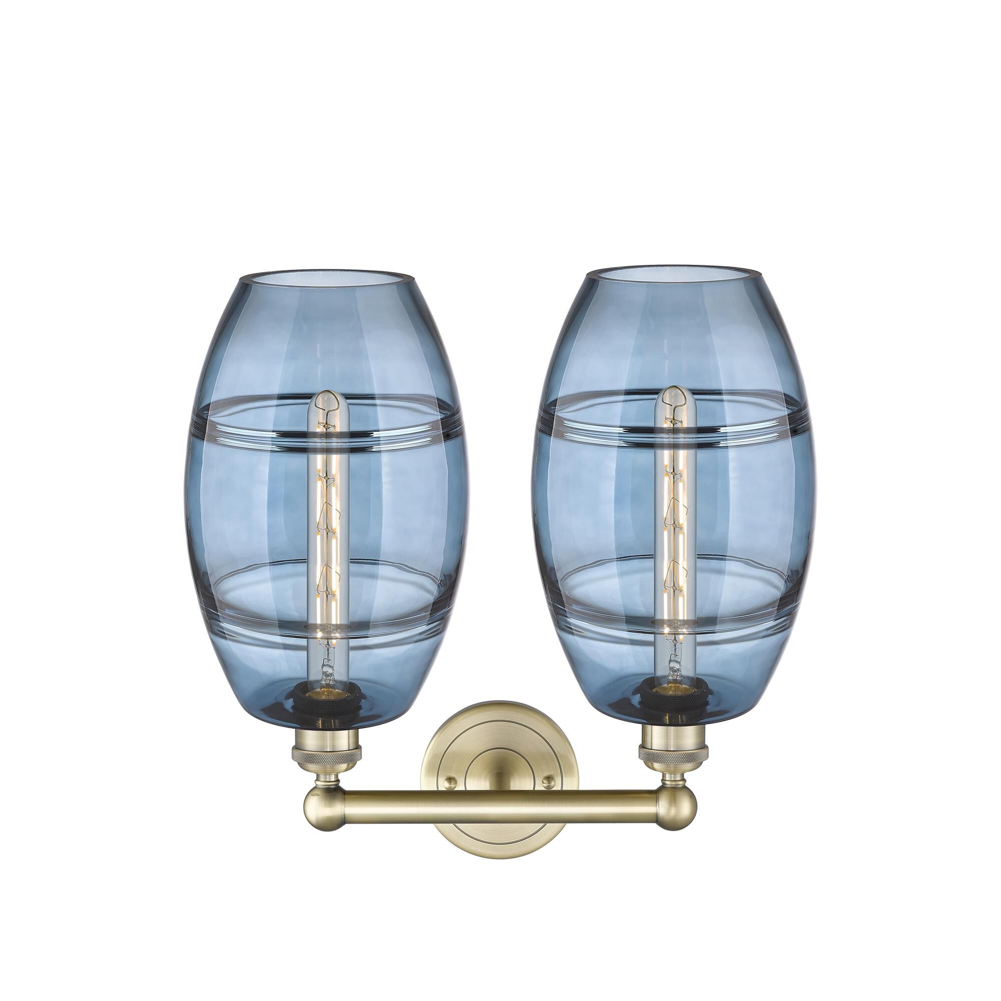 Shown in Antique Brass finish and Princess Blue glass