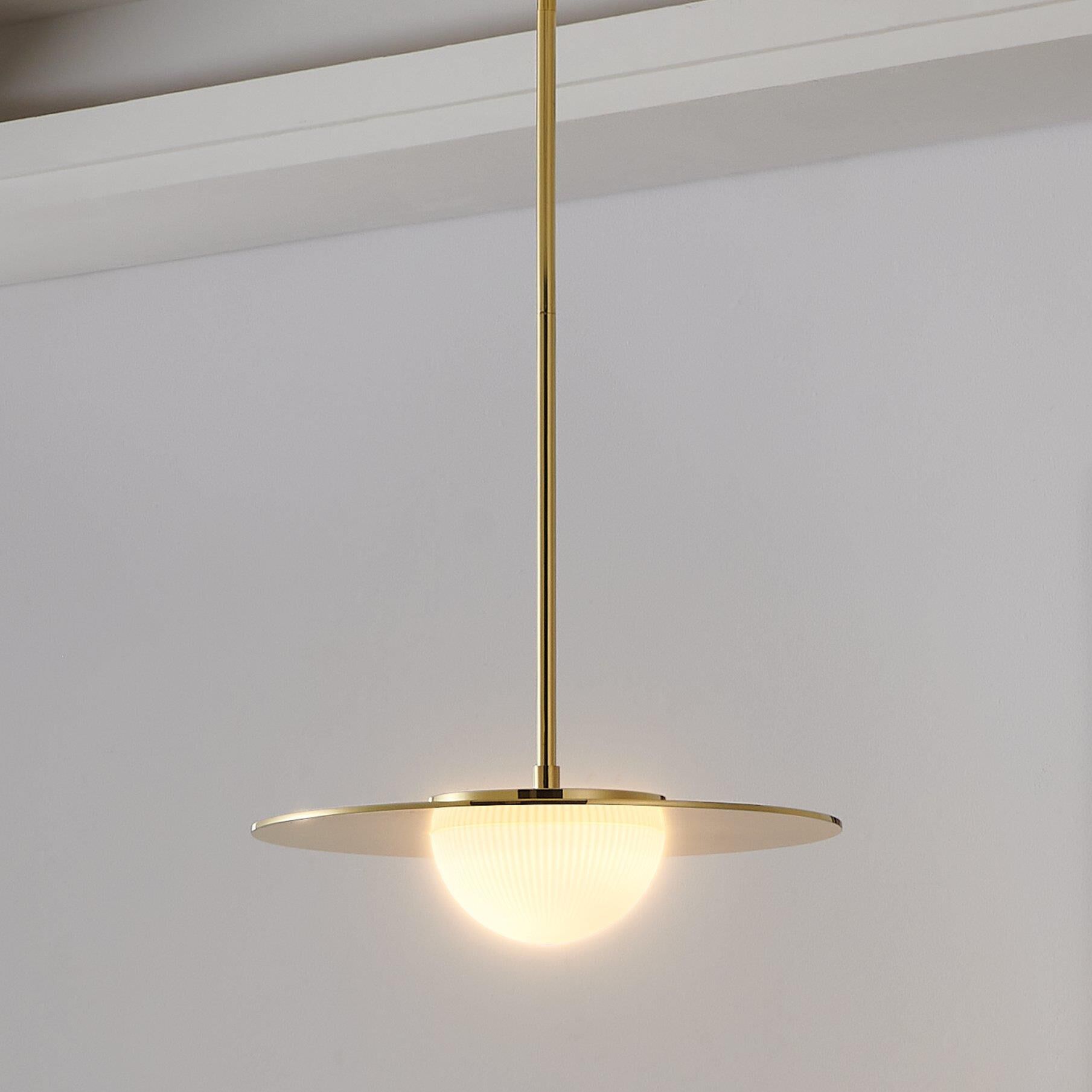 Shown in Polished Brass finish and Opal Ribbed glass