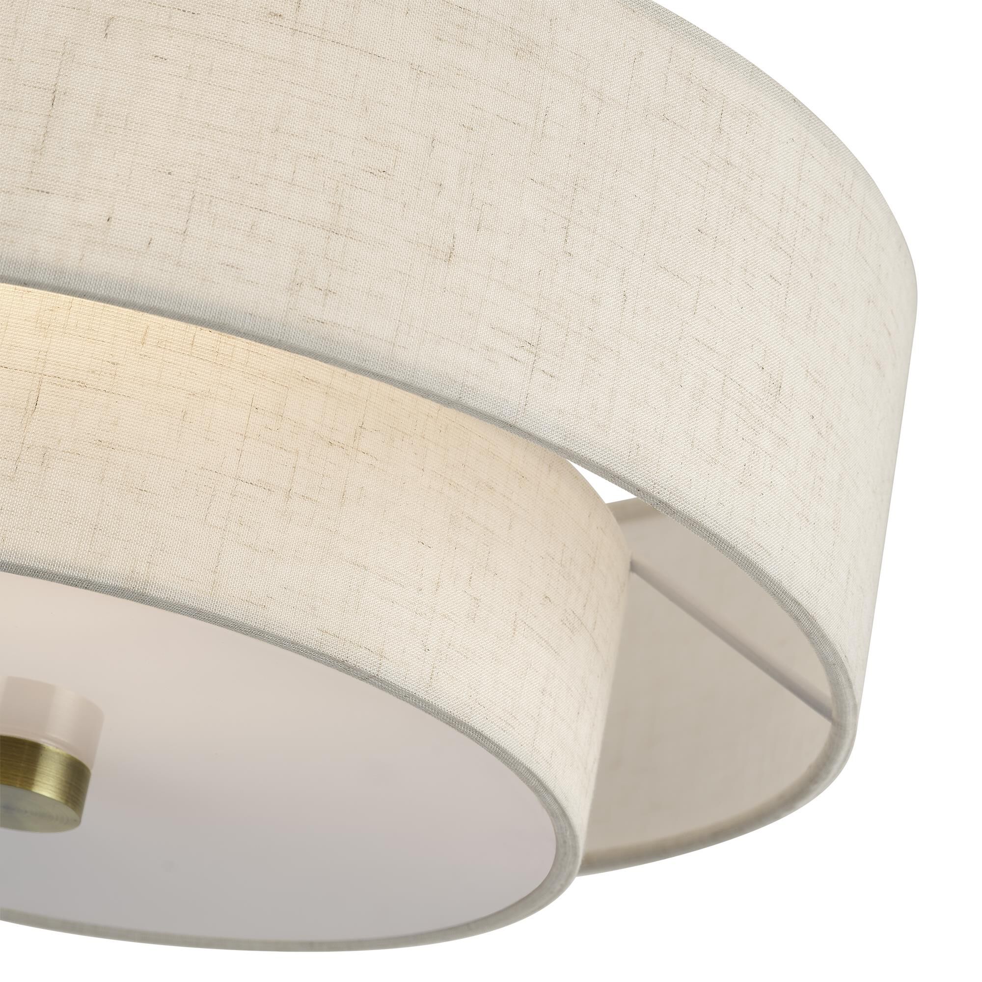 Shown in Antique Brass finish and Hand Crafted Oatmeal Color Fabric with White Color Inside shade