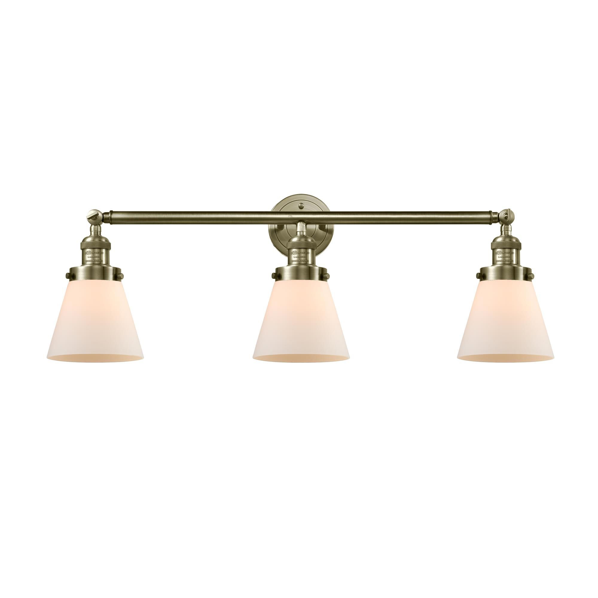 Shown in Antique Brass finish and Matte White Cased glass