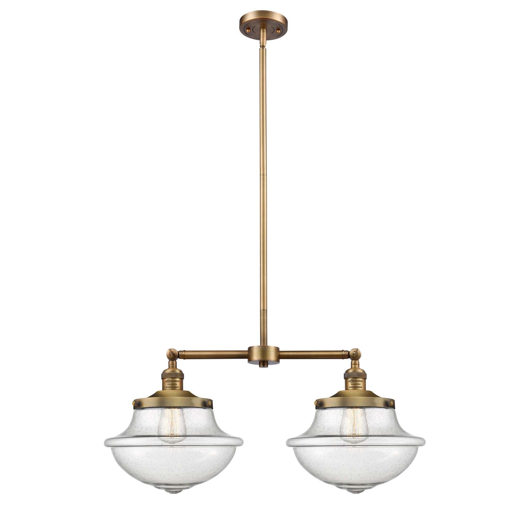 Shown in Brushed Brass finish and Seedy glass