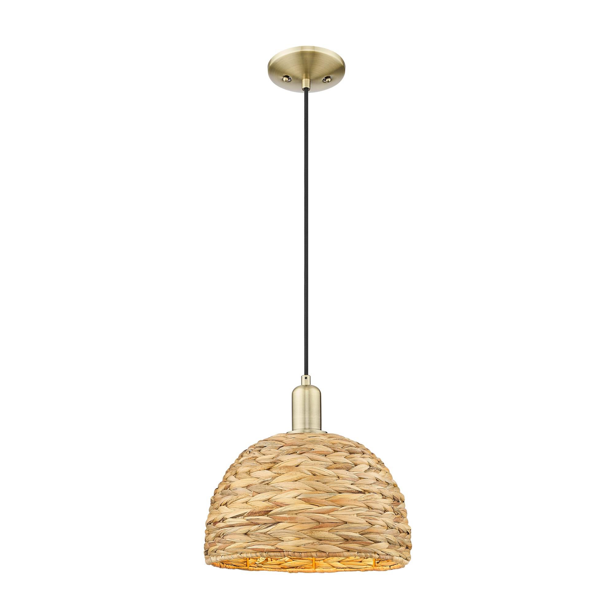 Shown in Antique Brass finish and Natural shade