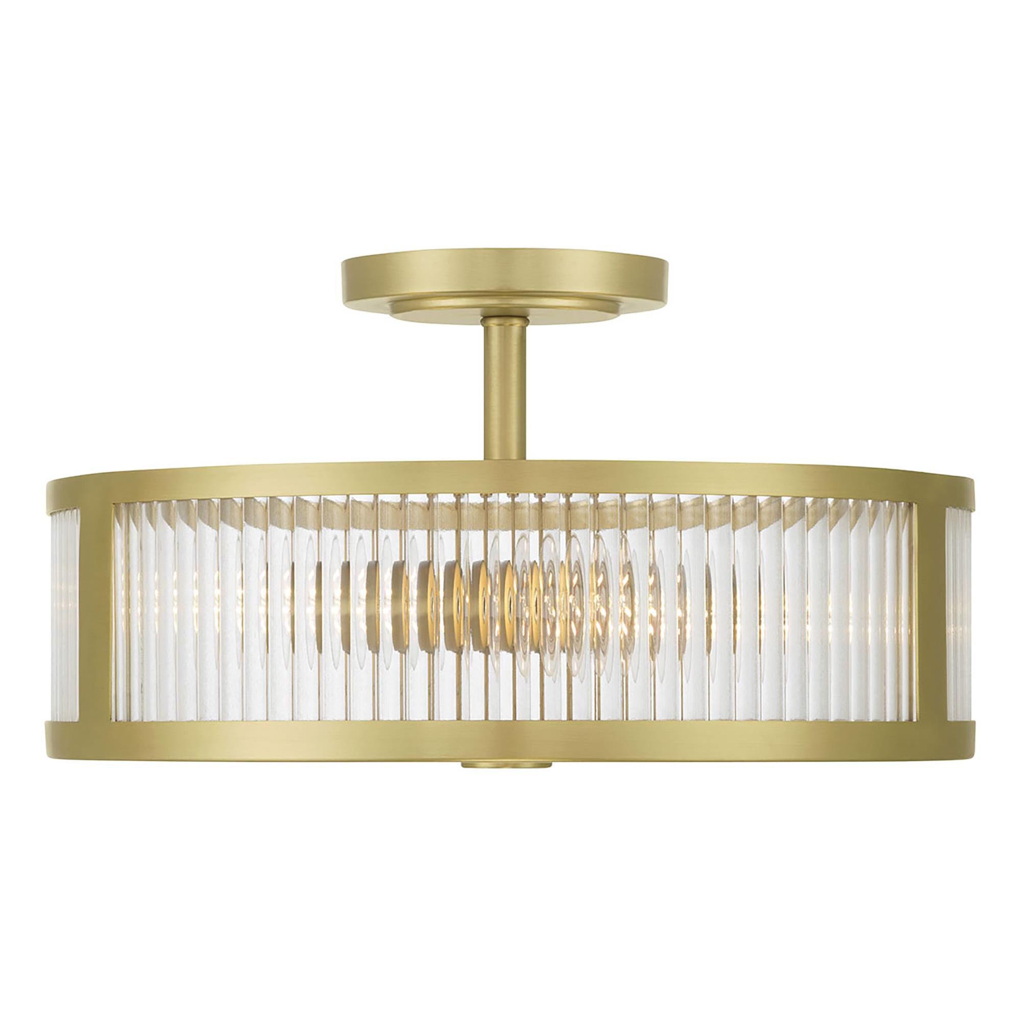 Shown in Vintage Brass finish and Clear Ribbed glass