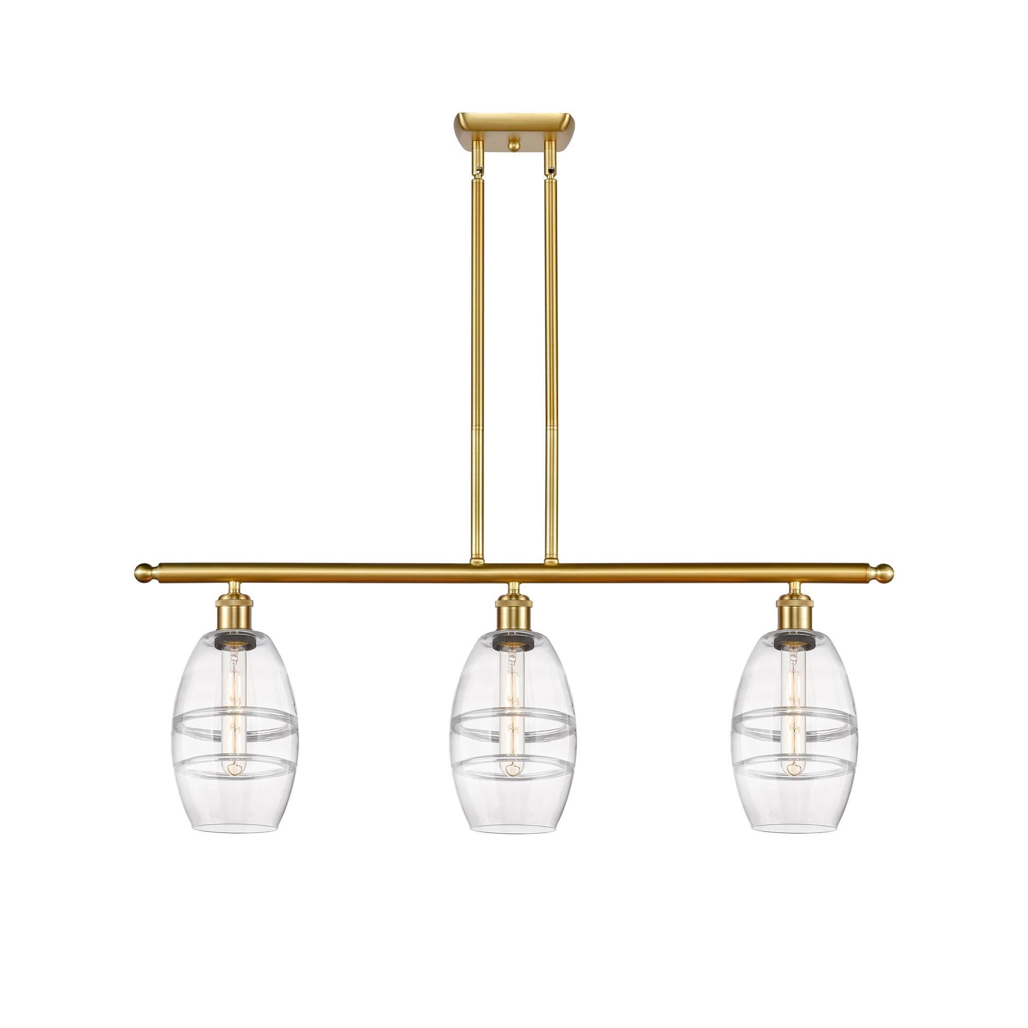 Shown in Satin Gold finish and Clear glass