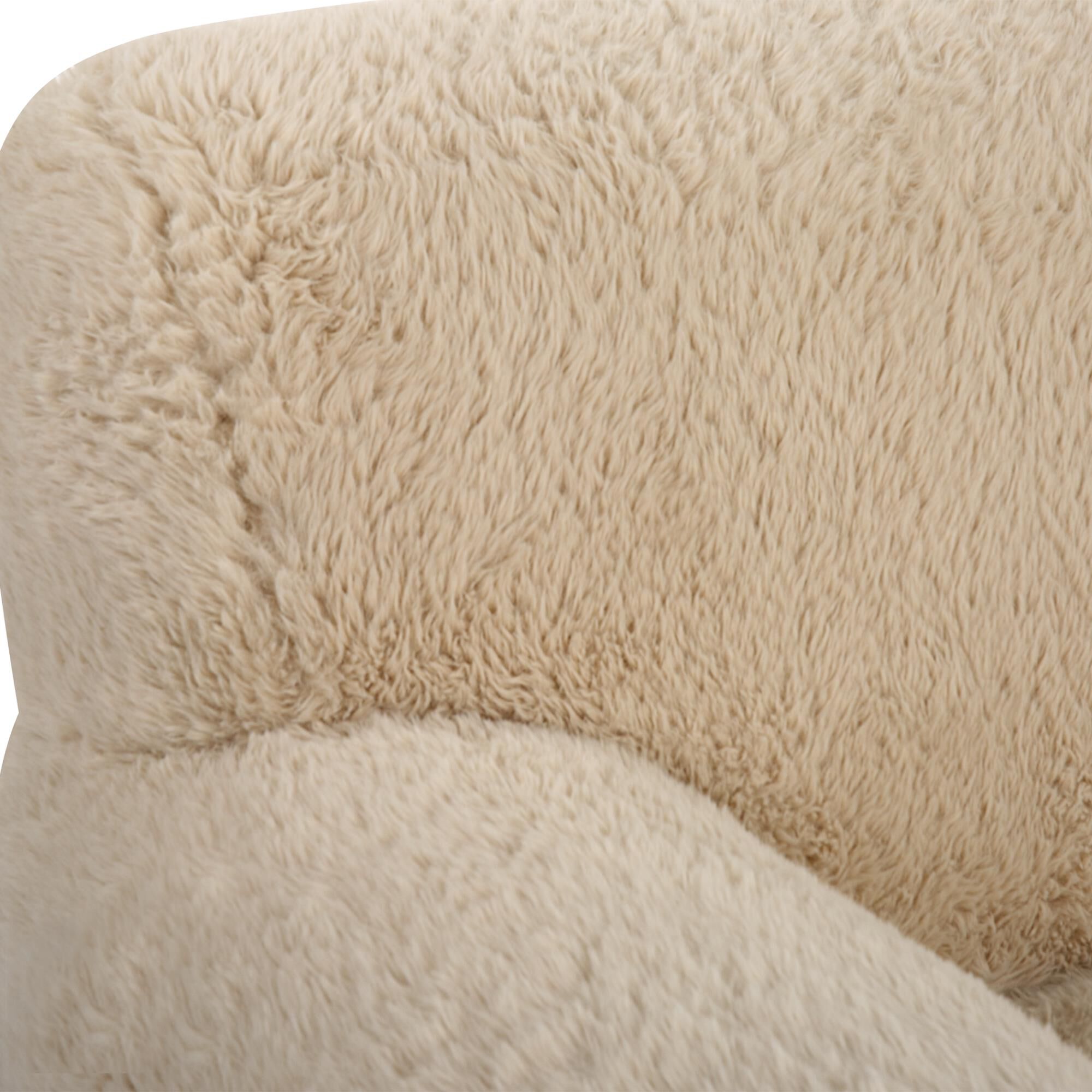 Shown in The Definition Of A Cozy Place To Rest, The Caramel Toned Long-Haired Faux Sheepskin Creates Rich Te finish
