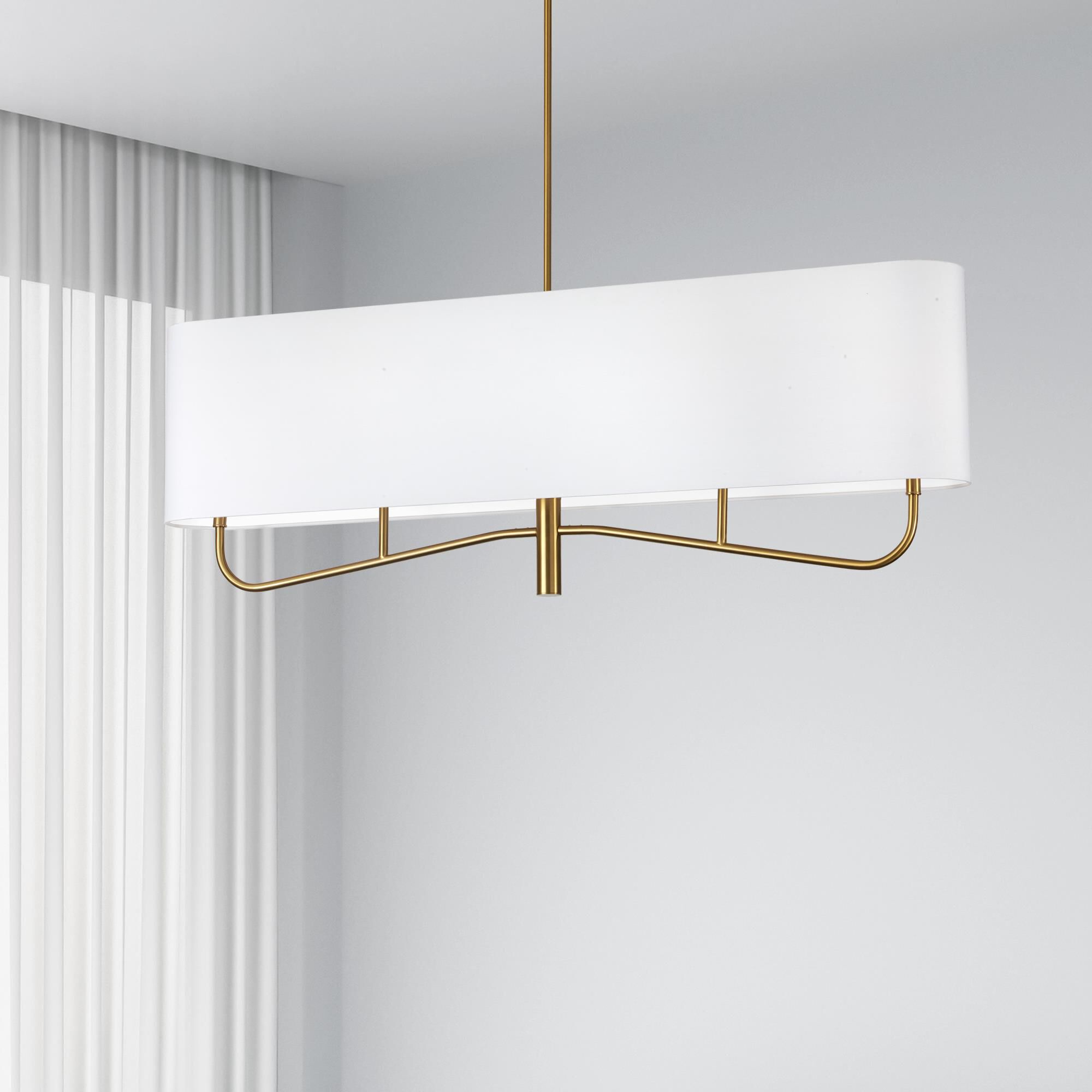 Shown in Aged Brass and White finish and White Fabric Oval shade