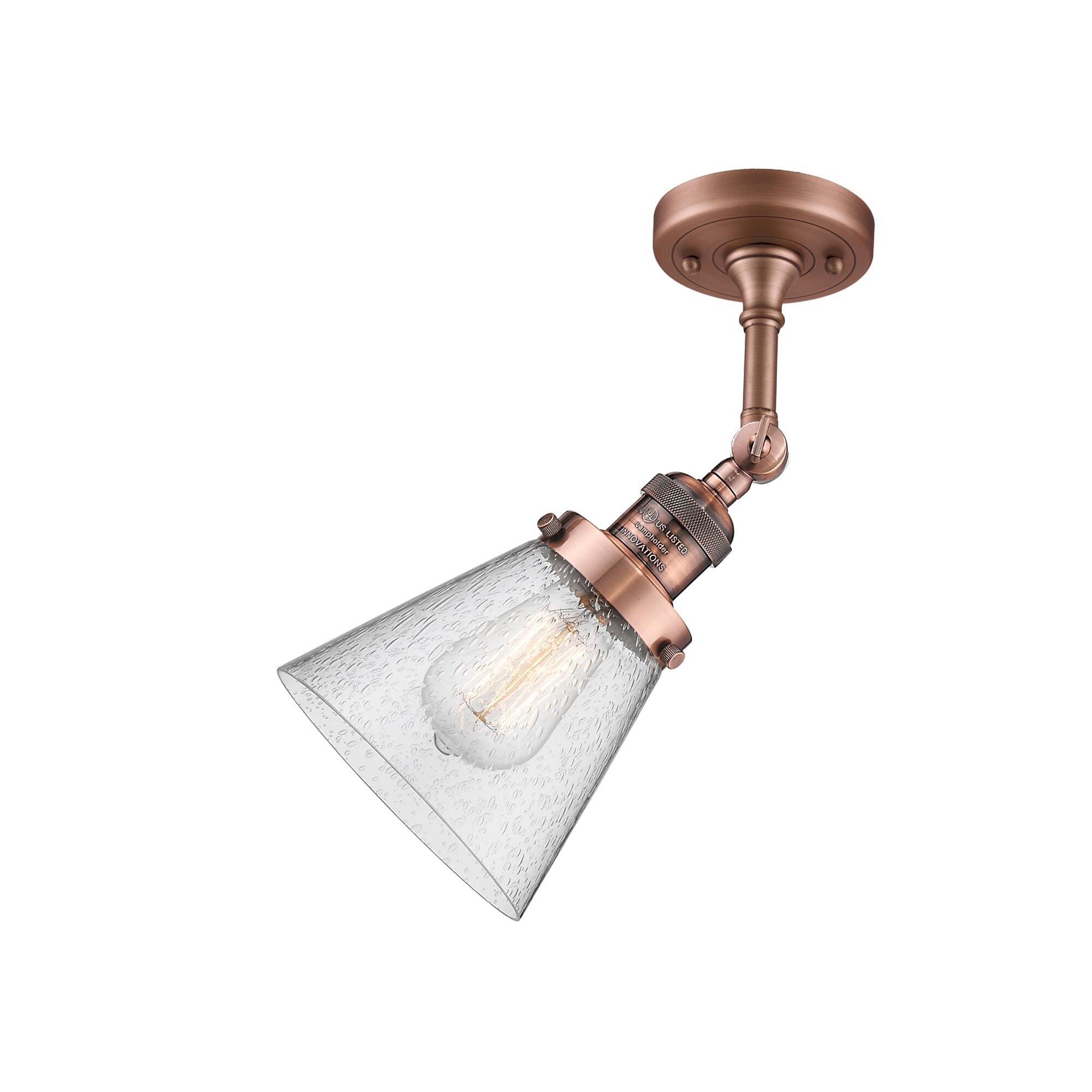 Shown in Antique Copper finish and Seedy glass and None accent