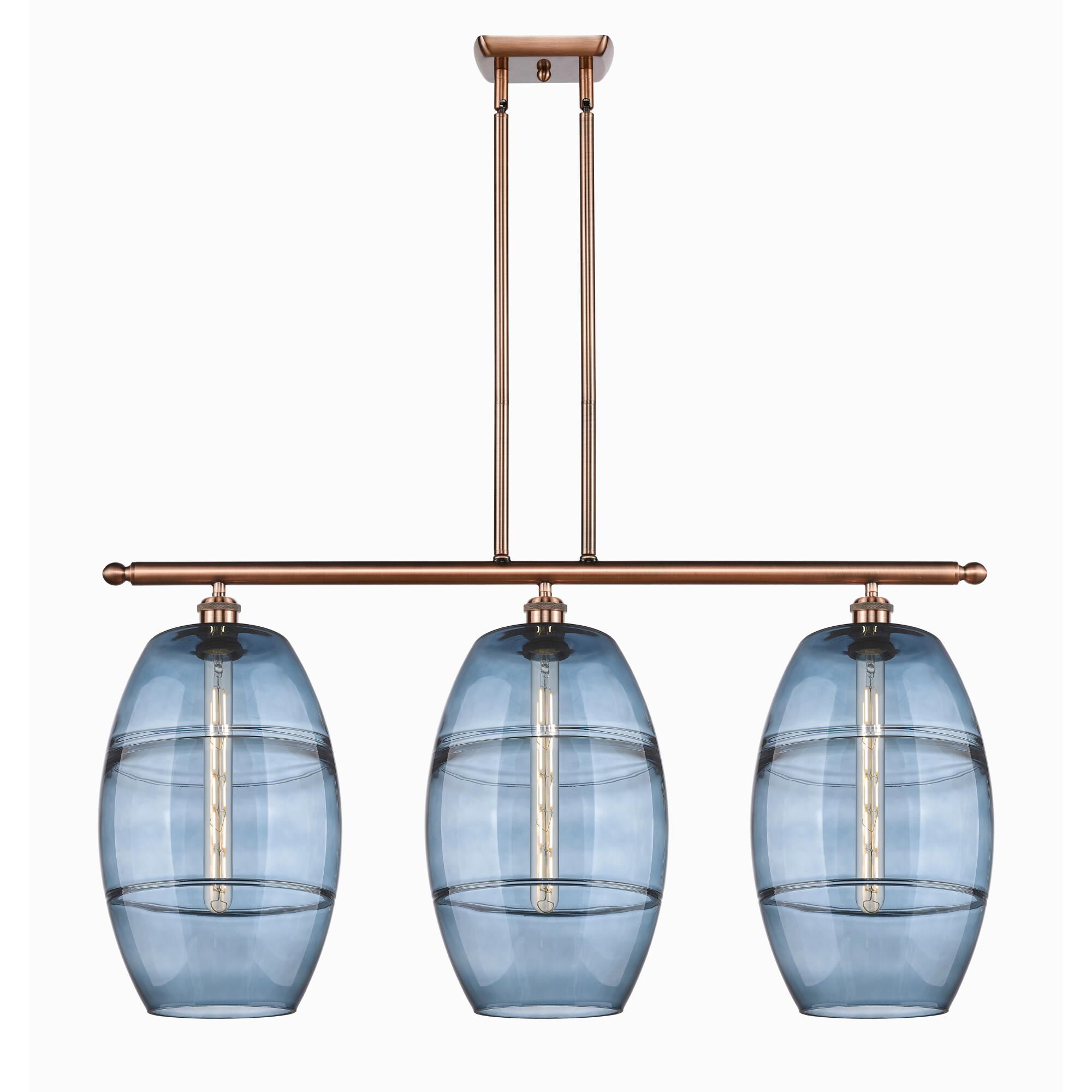 Shown in Antique Copper finish and Princess Blue glass