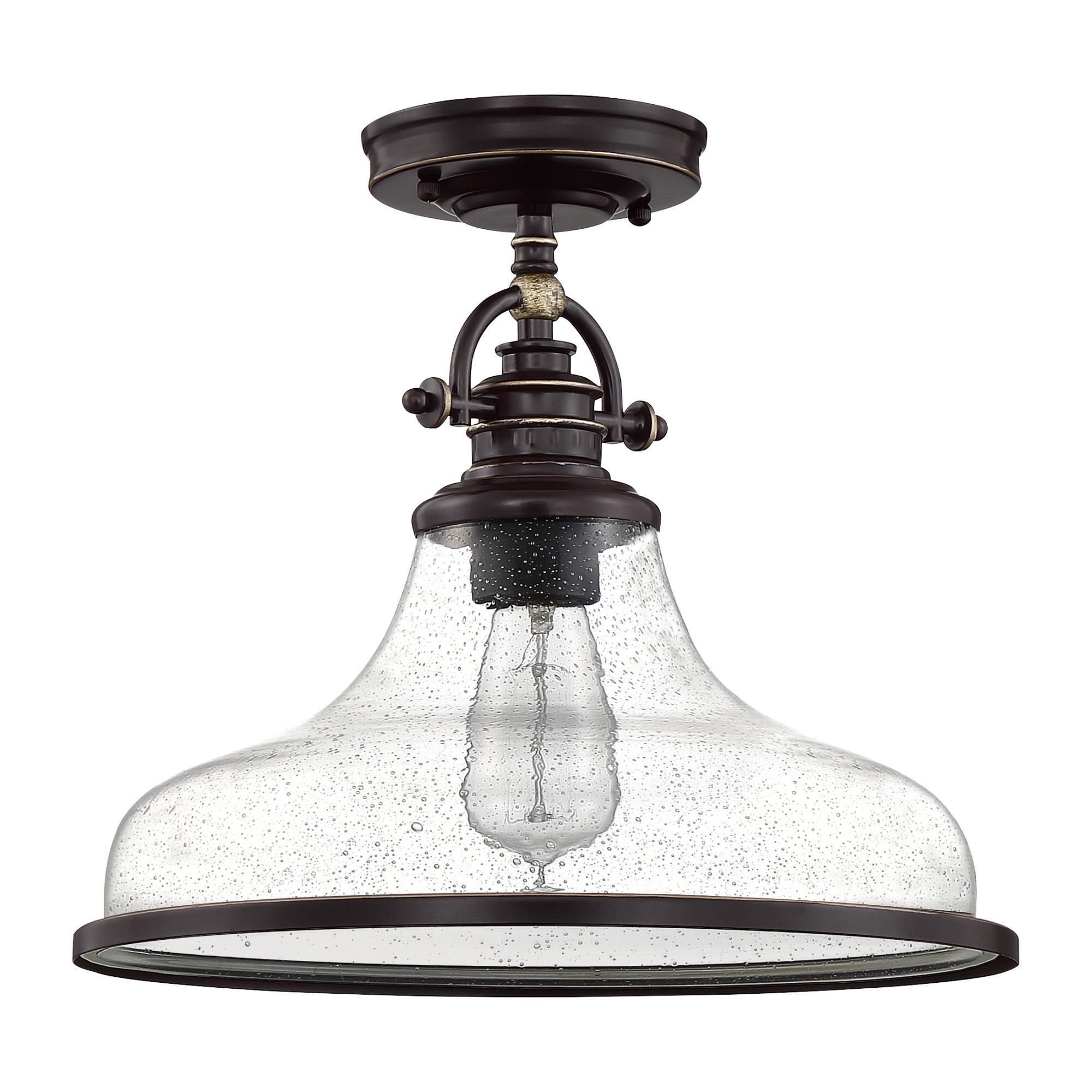 Shown in Palladian Bronze finish and Clear Seeded Glass shade