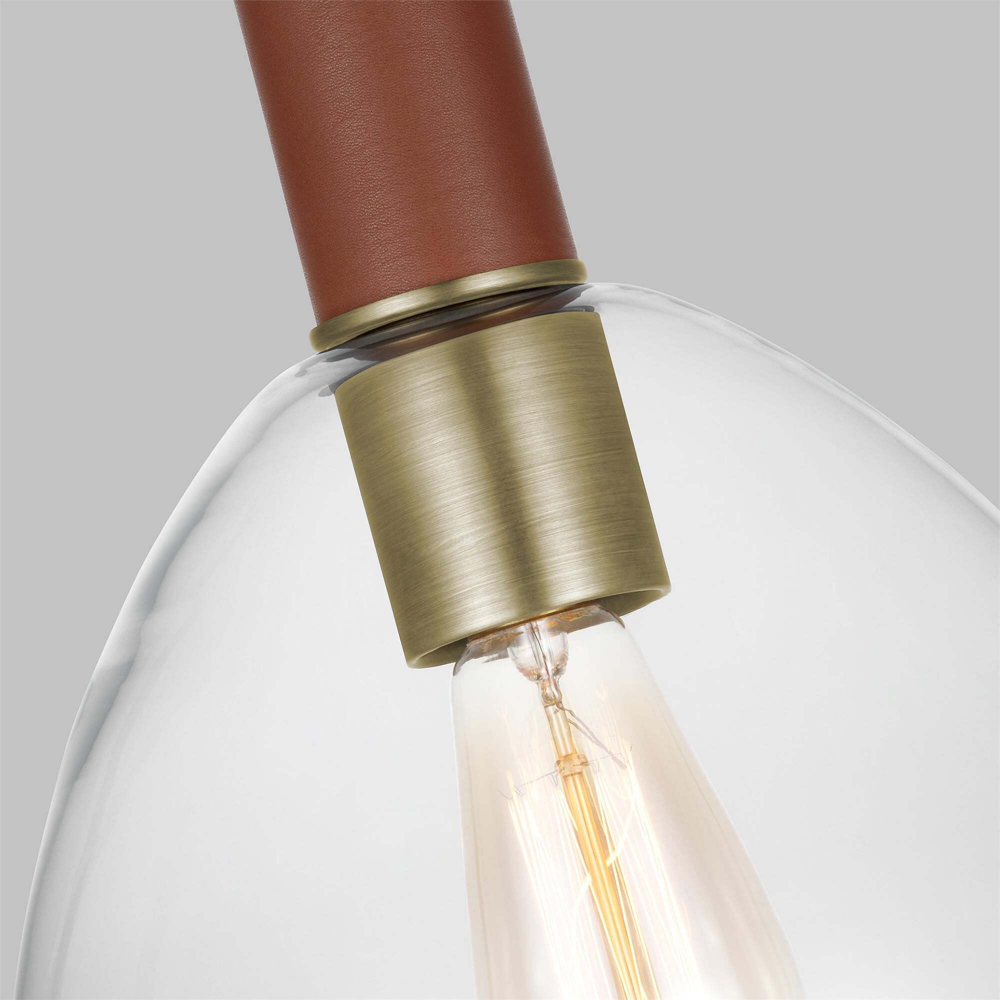 Shown in Time Worn Brass finish and Clear glass