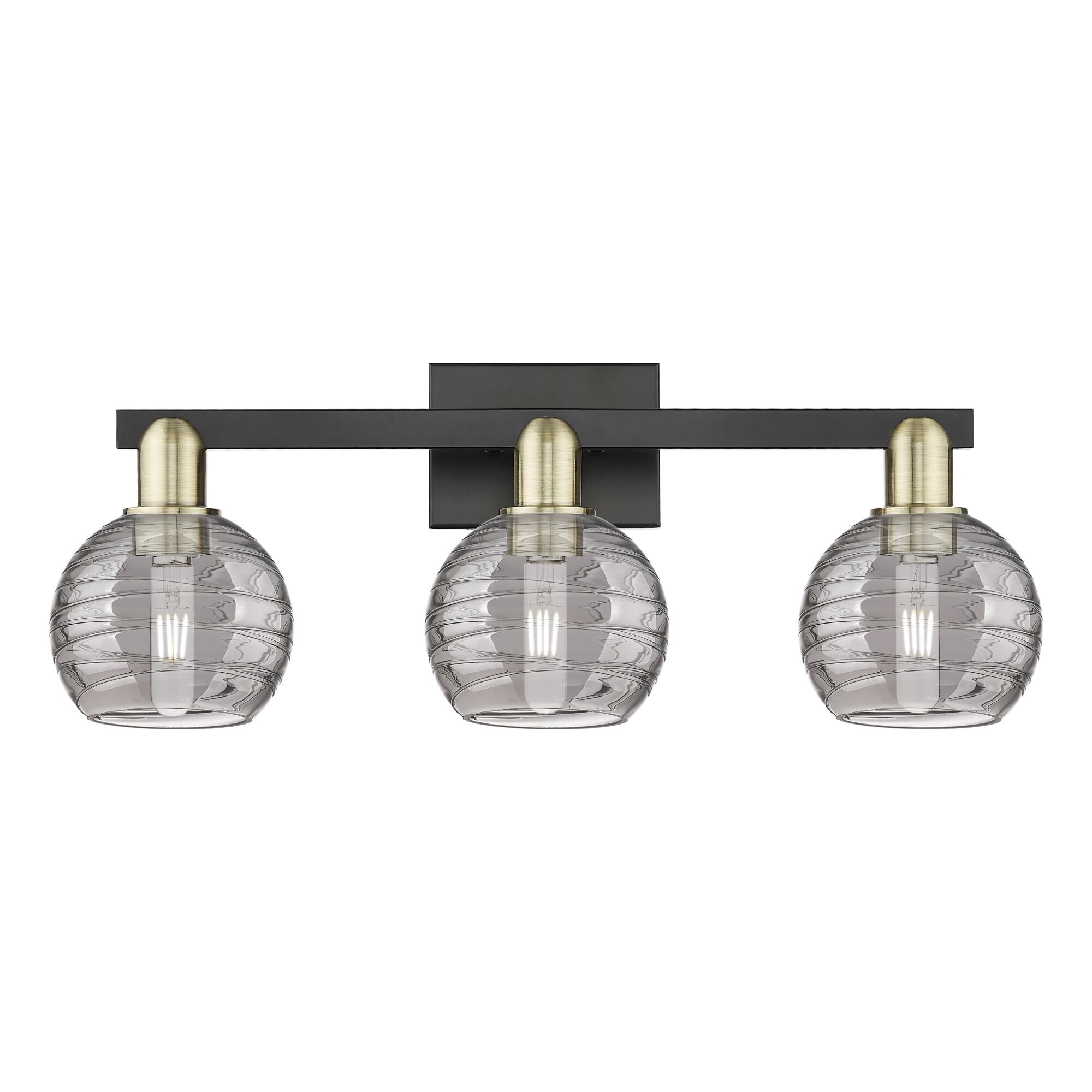 Shown in Black Antique Brass finish and Light Smoke Deco Swirl glass