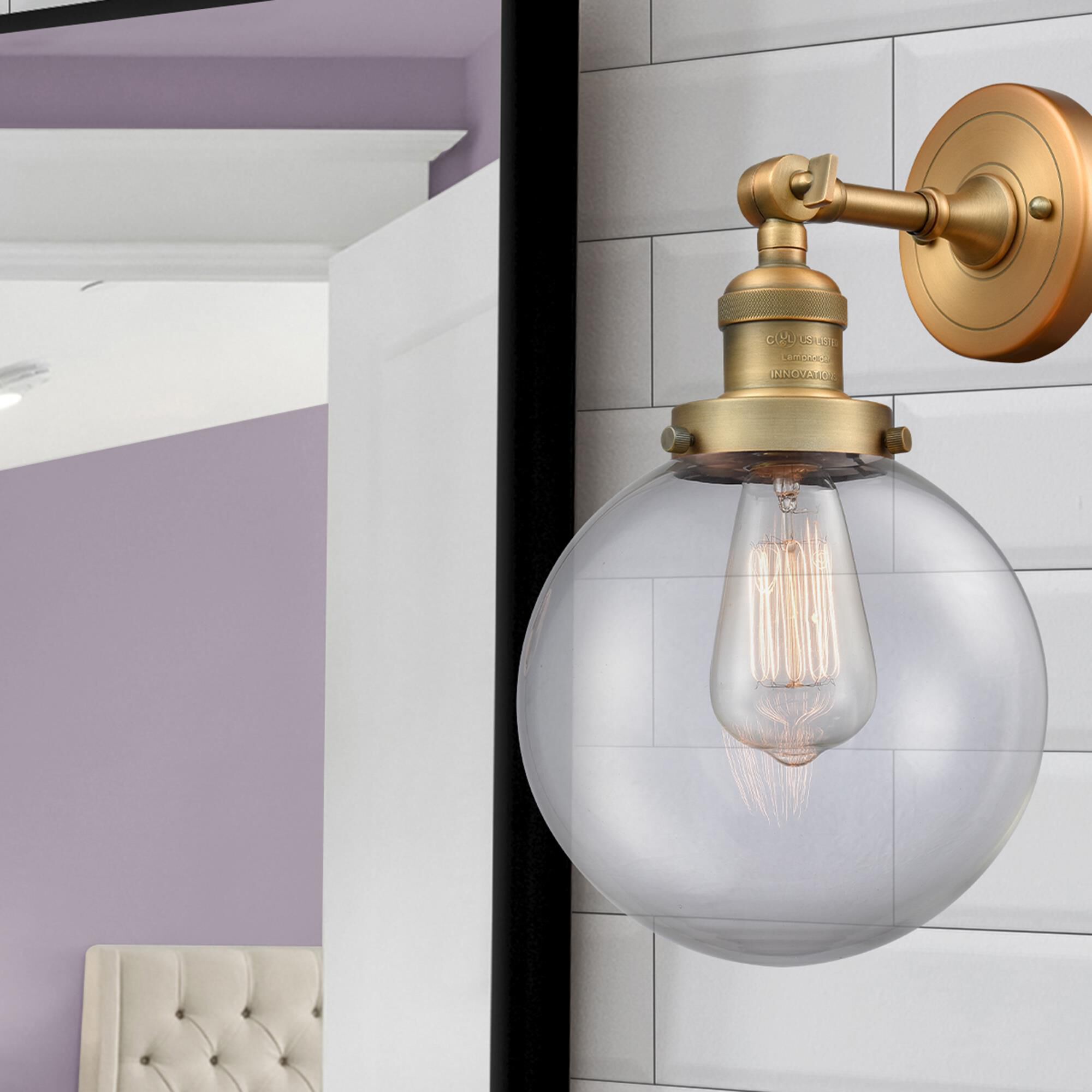 Shown in Brushed Brass finish and Clear glass and No Accent accent
