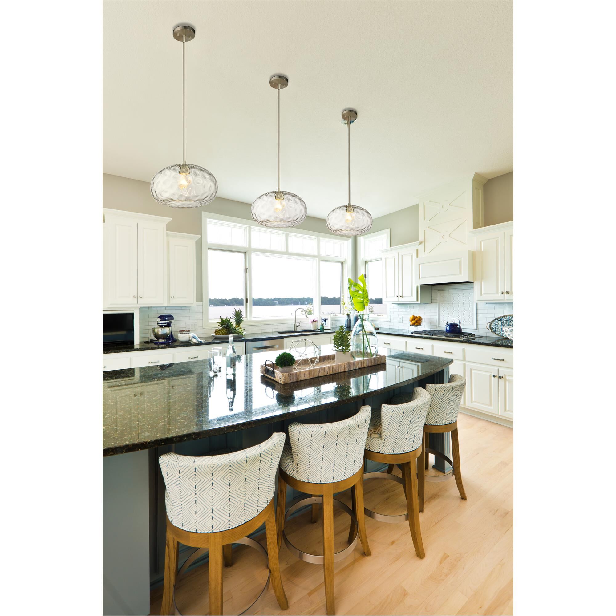 Shown in Brushed Nickel finish and Glass shade