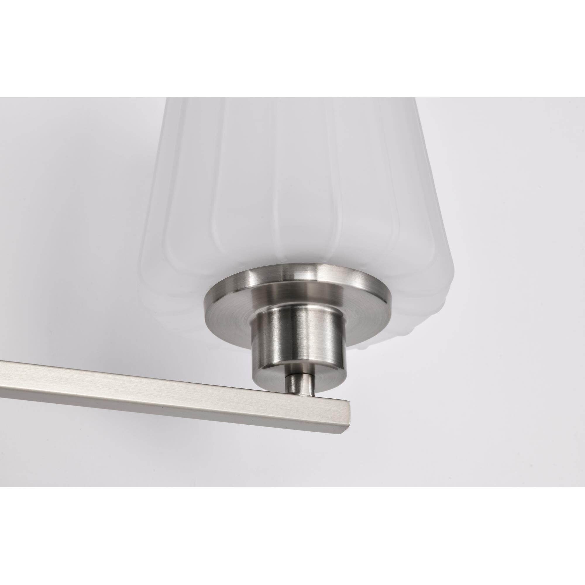 Shown in Brushed Nickel finish and Etched White glass