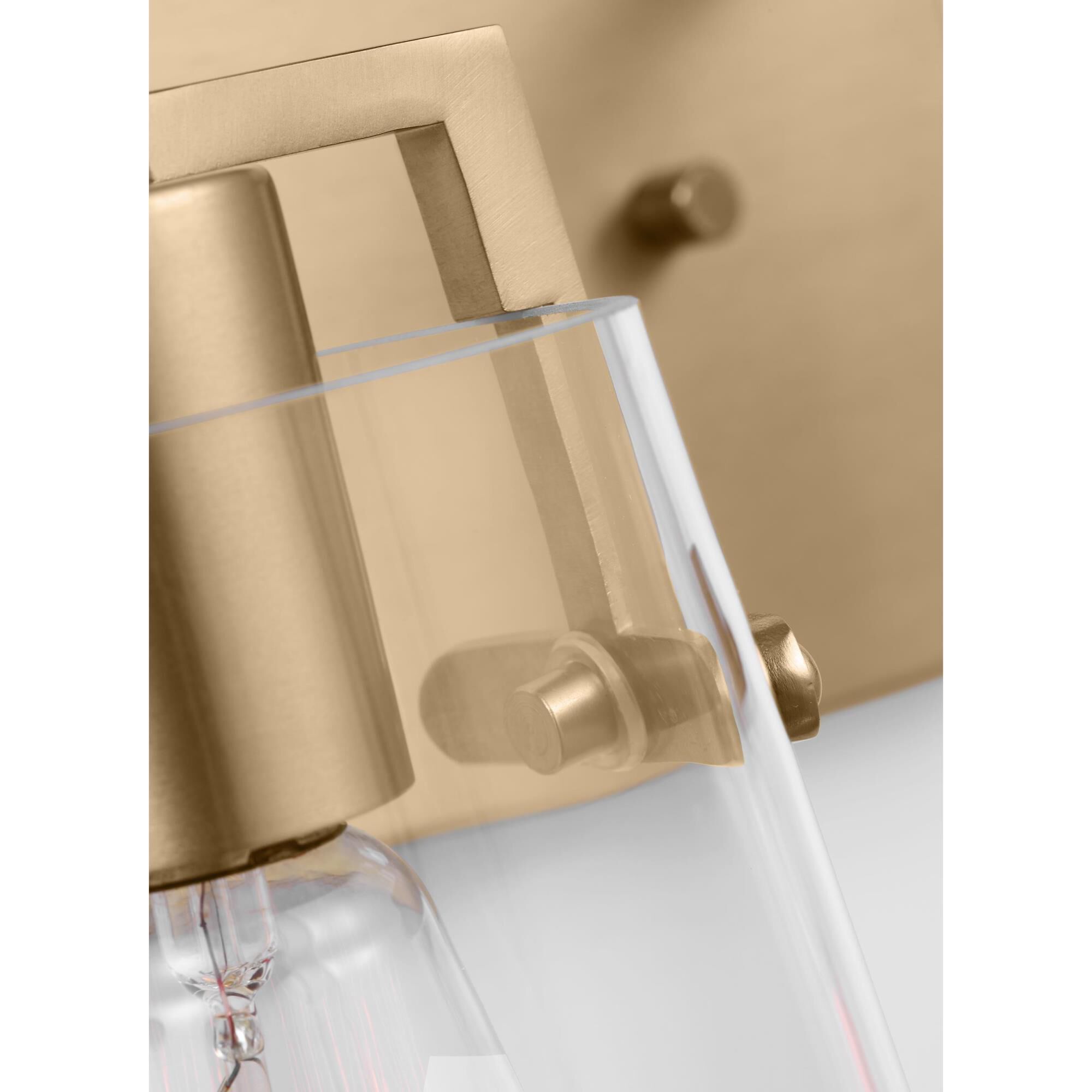 Shown in Satin Brass finish and Clear Glass s shade