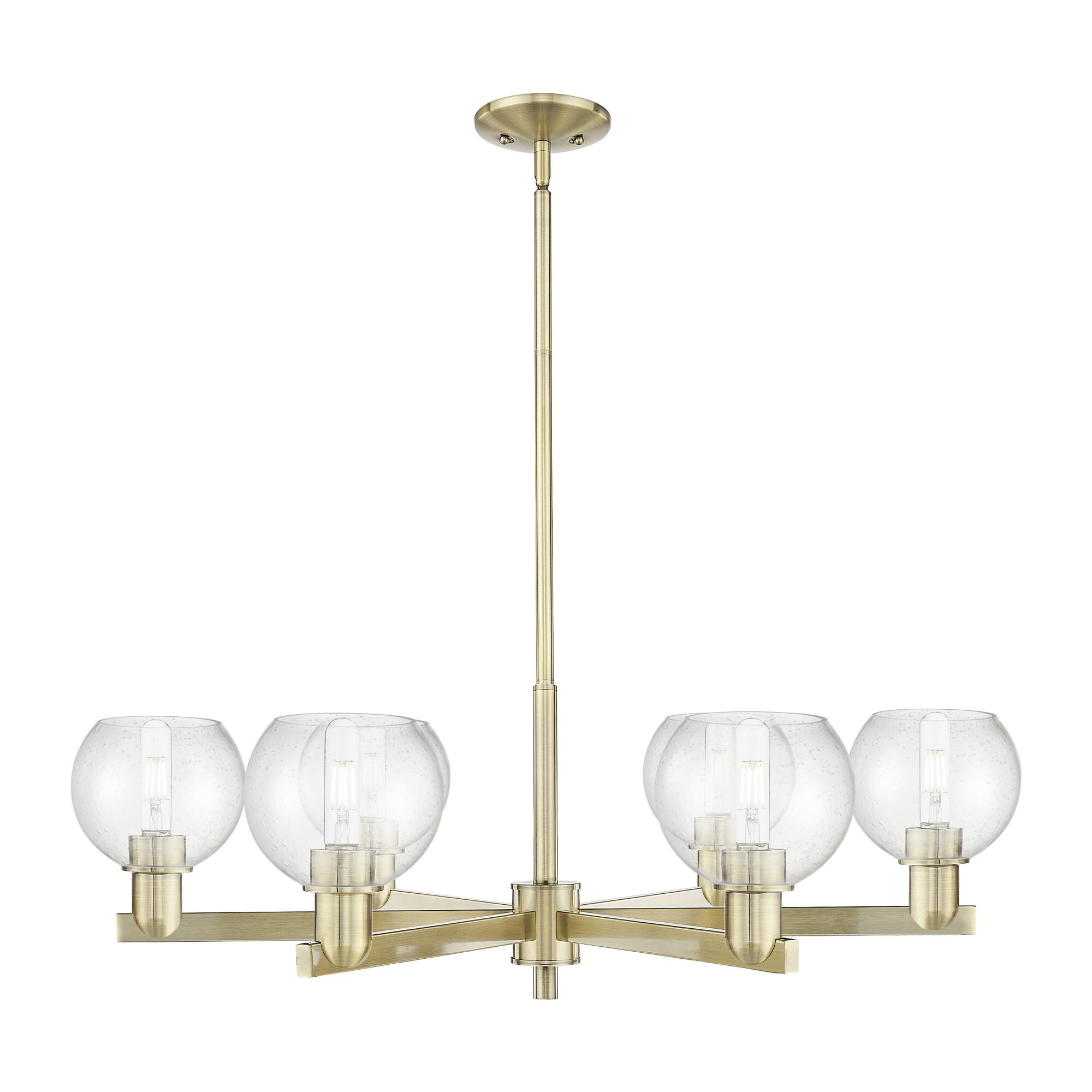 Shown in Antique Brass finish and Seedy glass