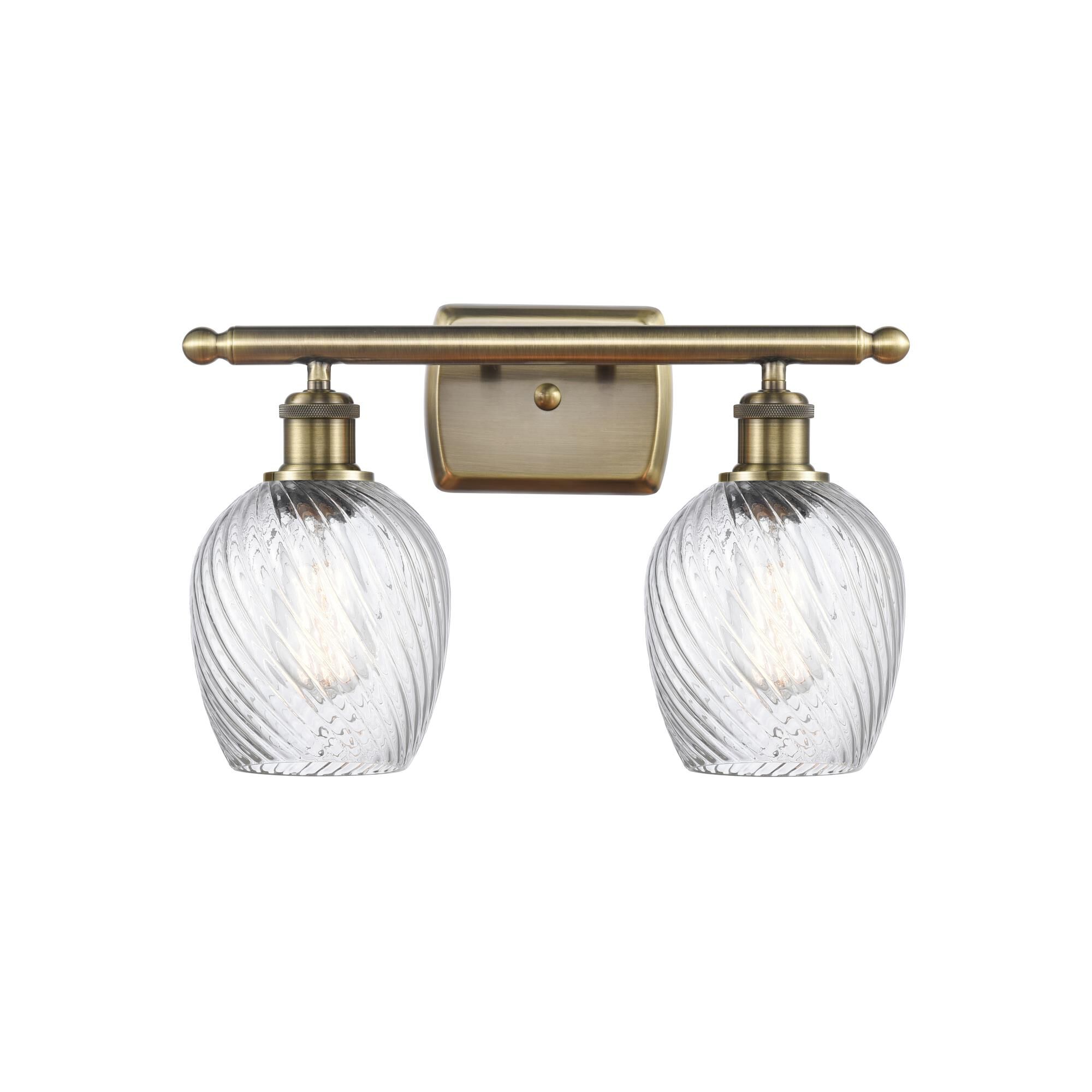 Shown in Antique Brass finish and Globe glass and Glass shade